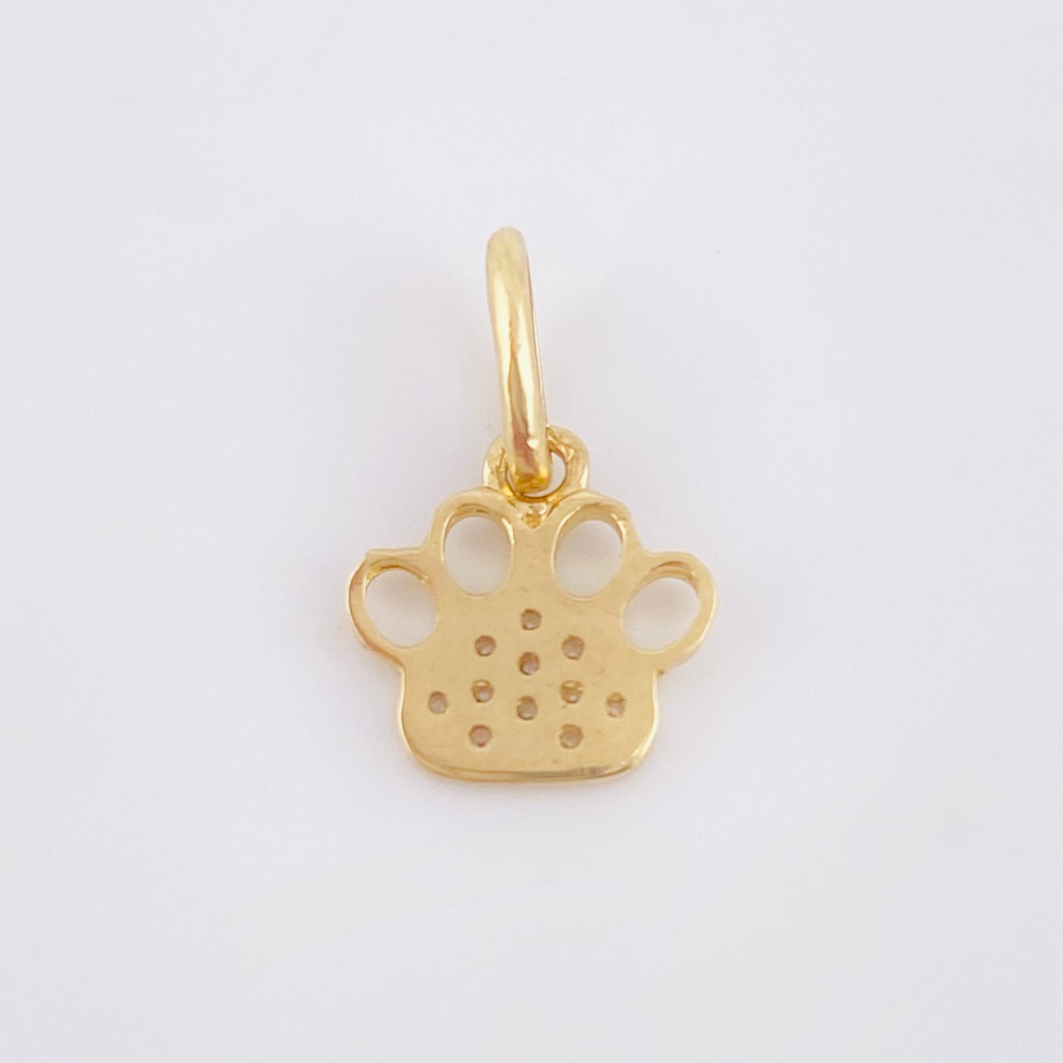 Dije Huella 0.65gr / 1/2 in / Oro Amarillo 18K
