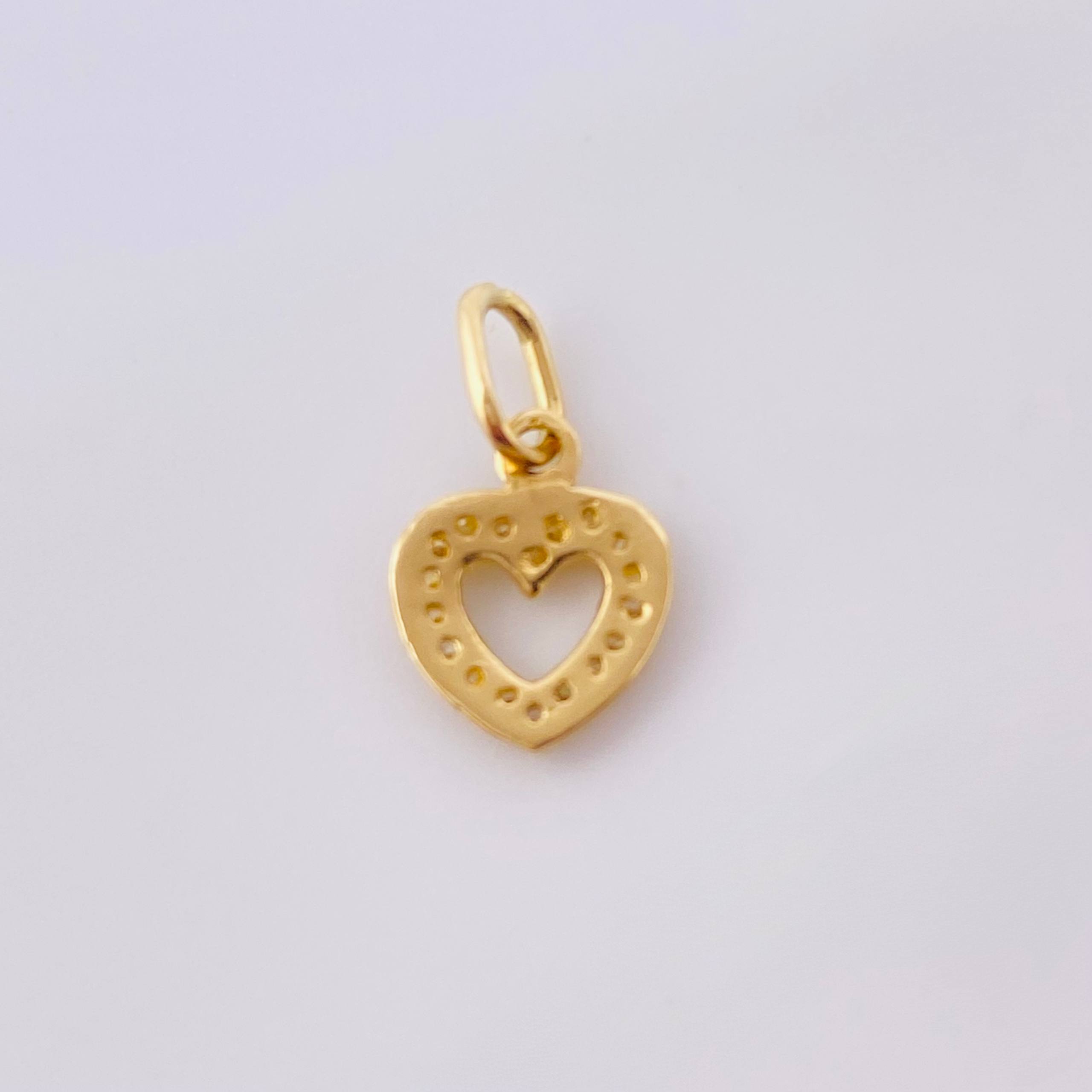 Dije Silueta Corazon 0.7gr / 1/2 in / Oro Amarillo 18K