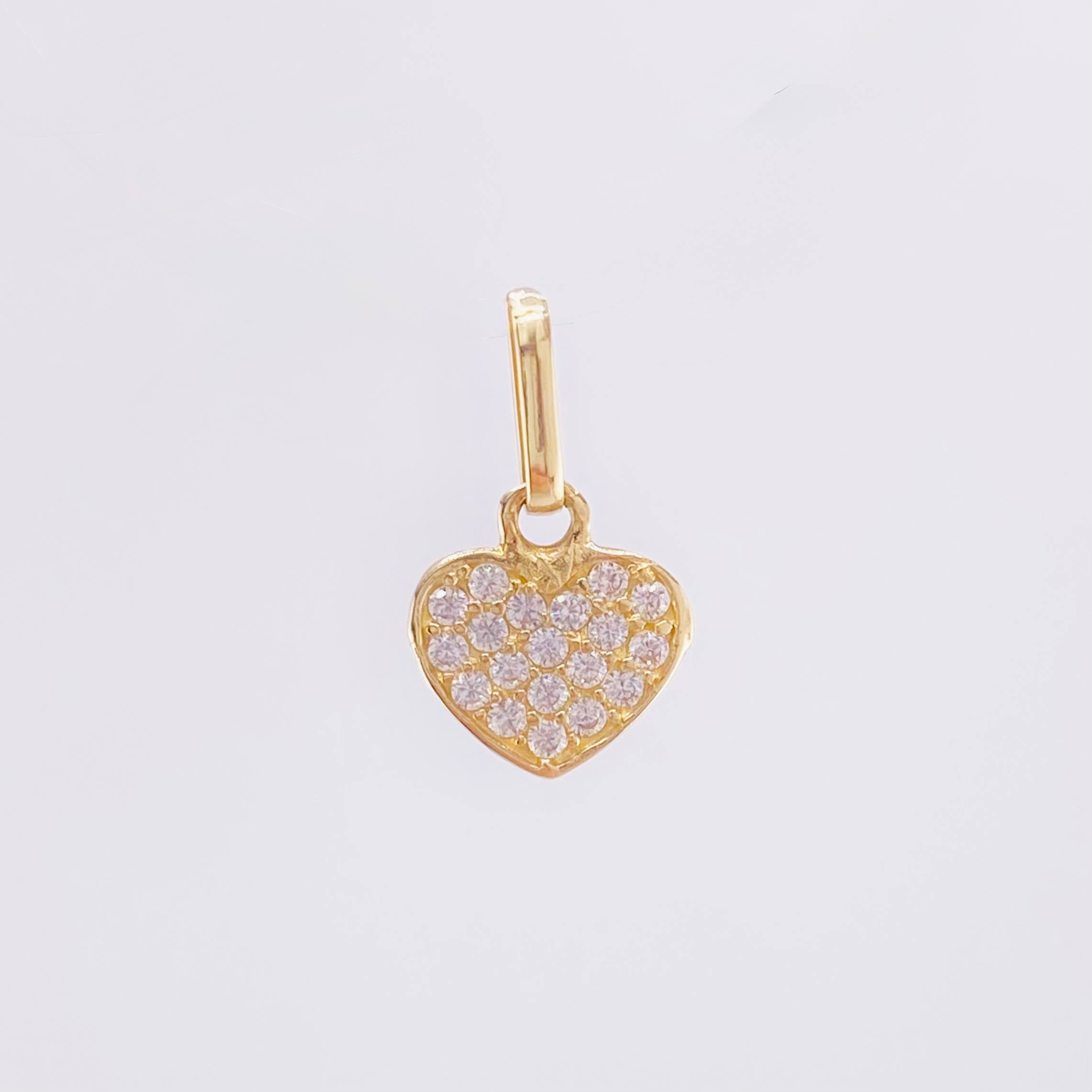 Dije Corazon Tupido 0.7gr / 1/2 in / Oro Amarillo 18K