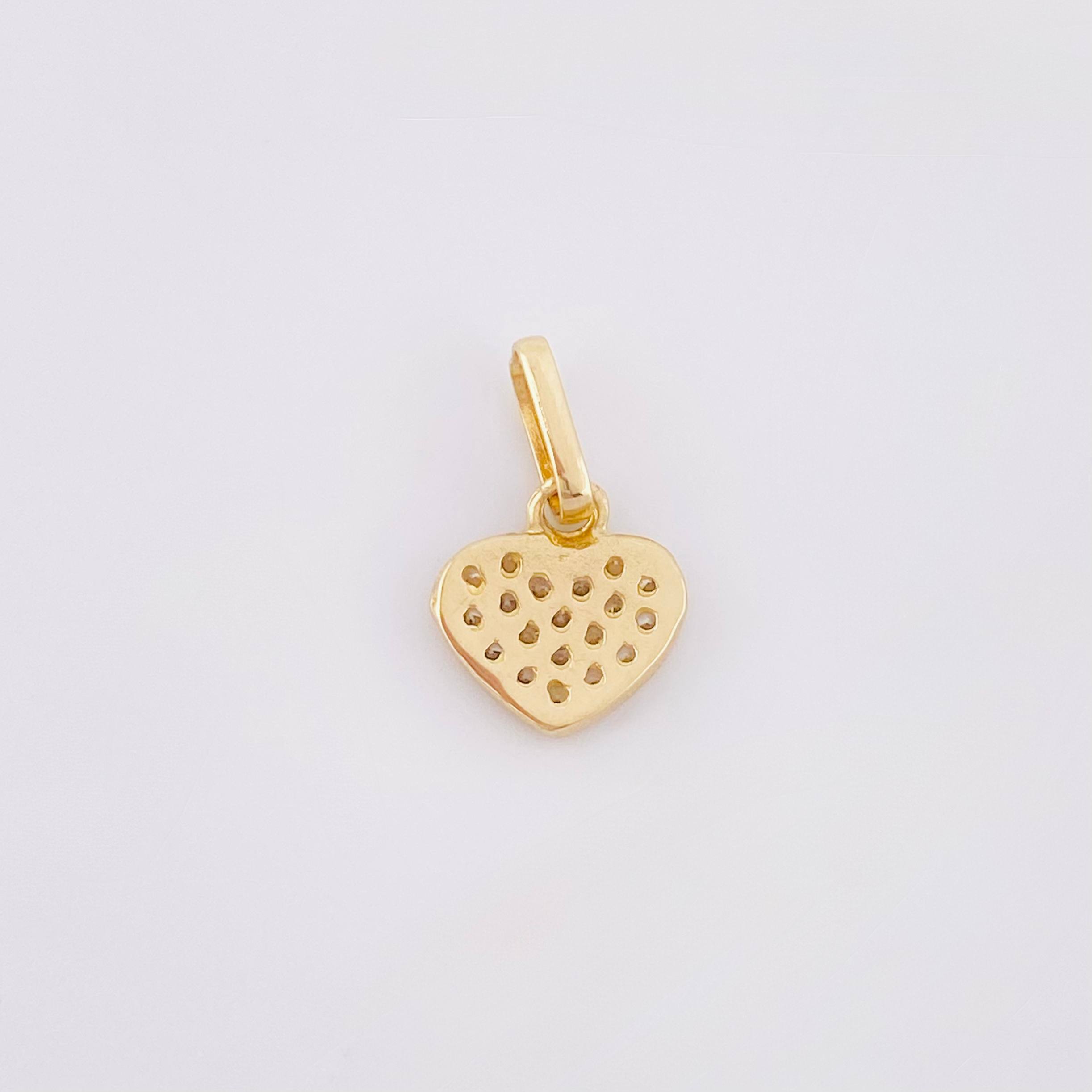 Dije Corazon Tupido 0.7gr / 1/2 in / Oro Amarillo 18K