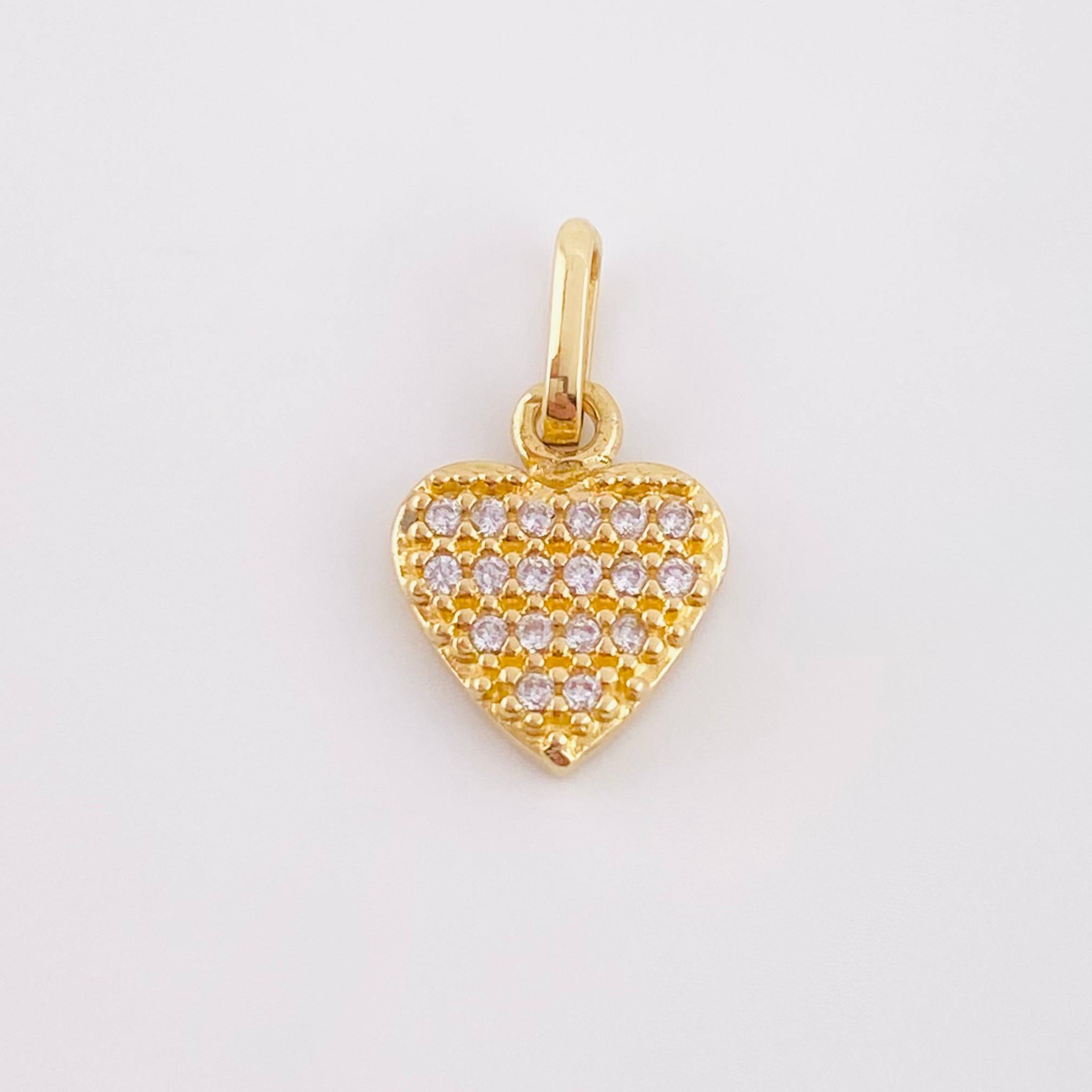 Dije Corazon Tupido 0.9gr / 1/2 in / Oro Amarillo 18K ©