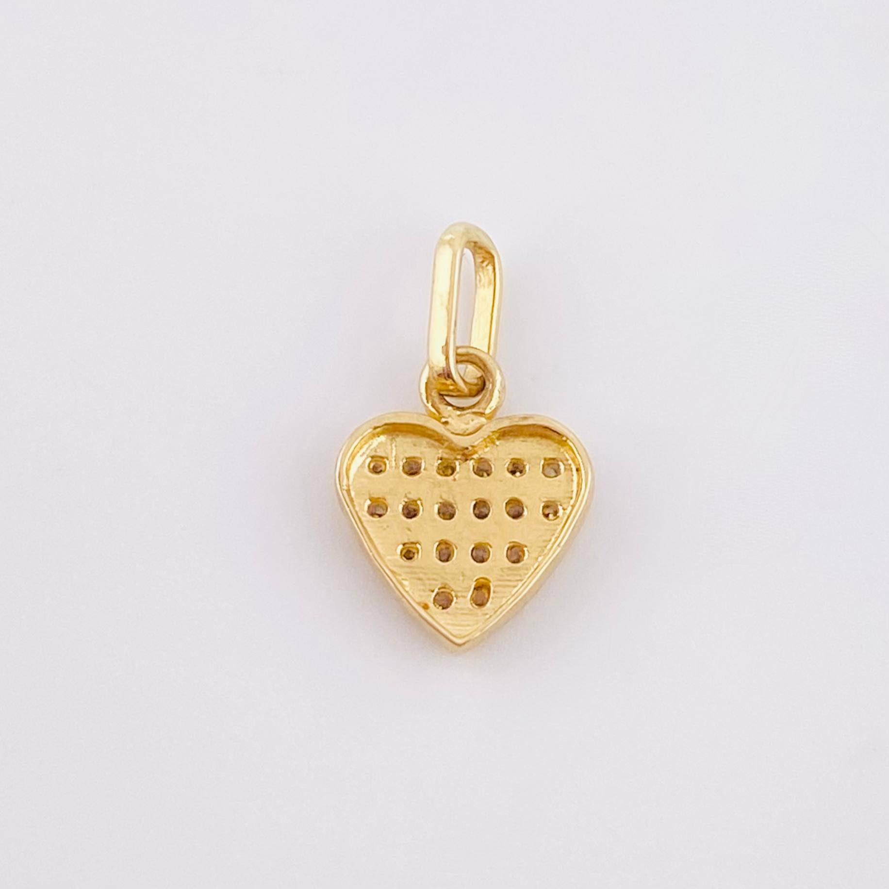 Dije Corazon Tupido 0.9gr / 1/2 in / Oro Amarillo 18K ©