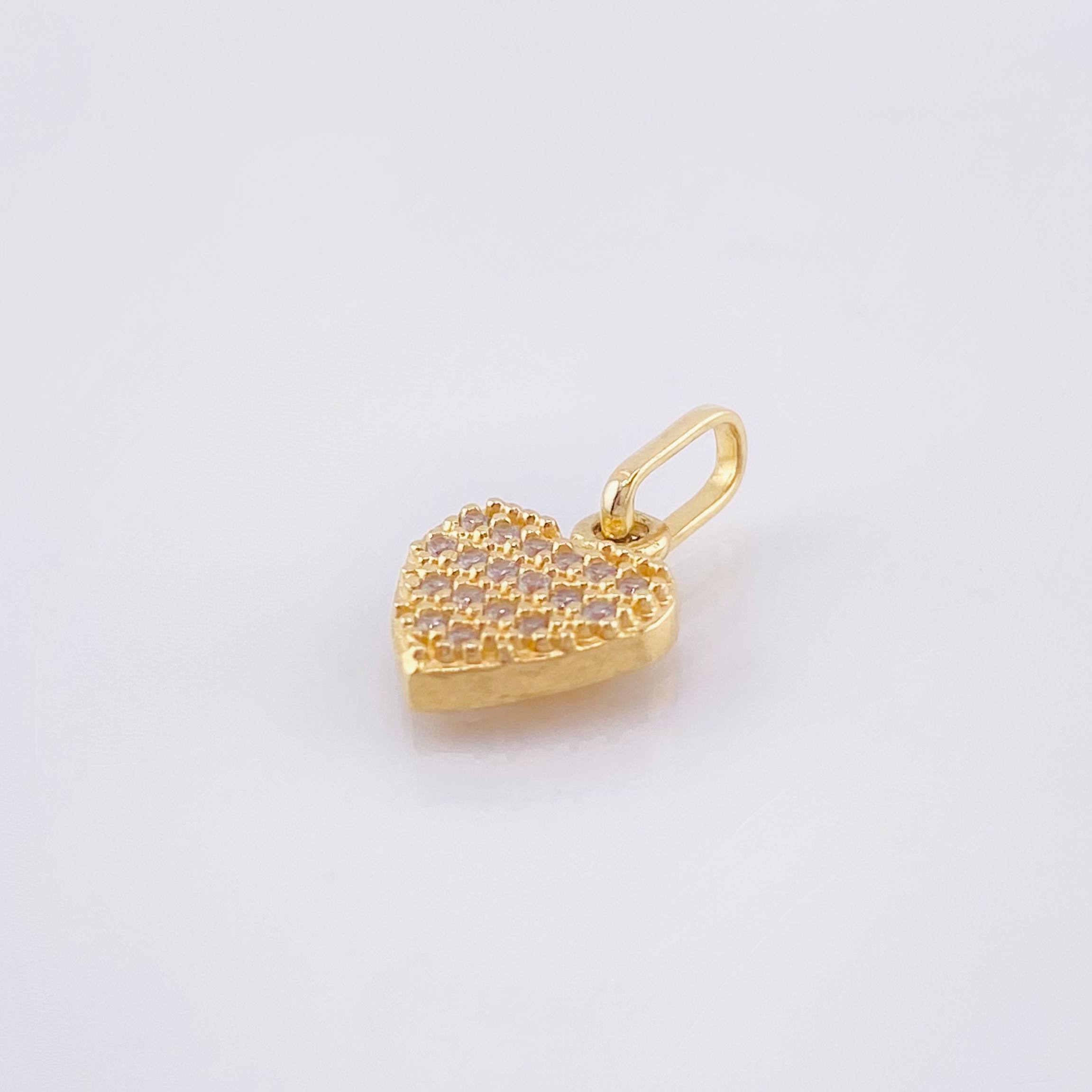 Dije Corazon Tupido 0.9gr / 1/2 in / Oro Amarillo 18K ©