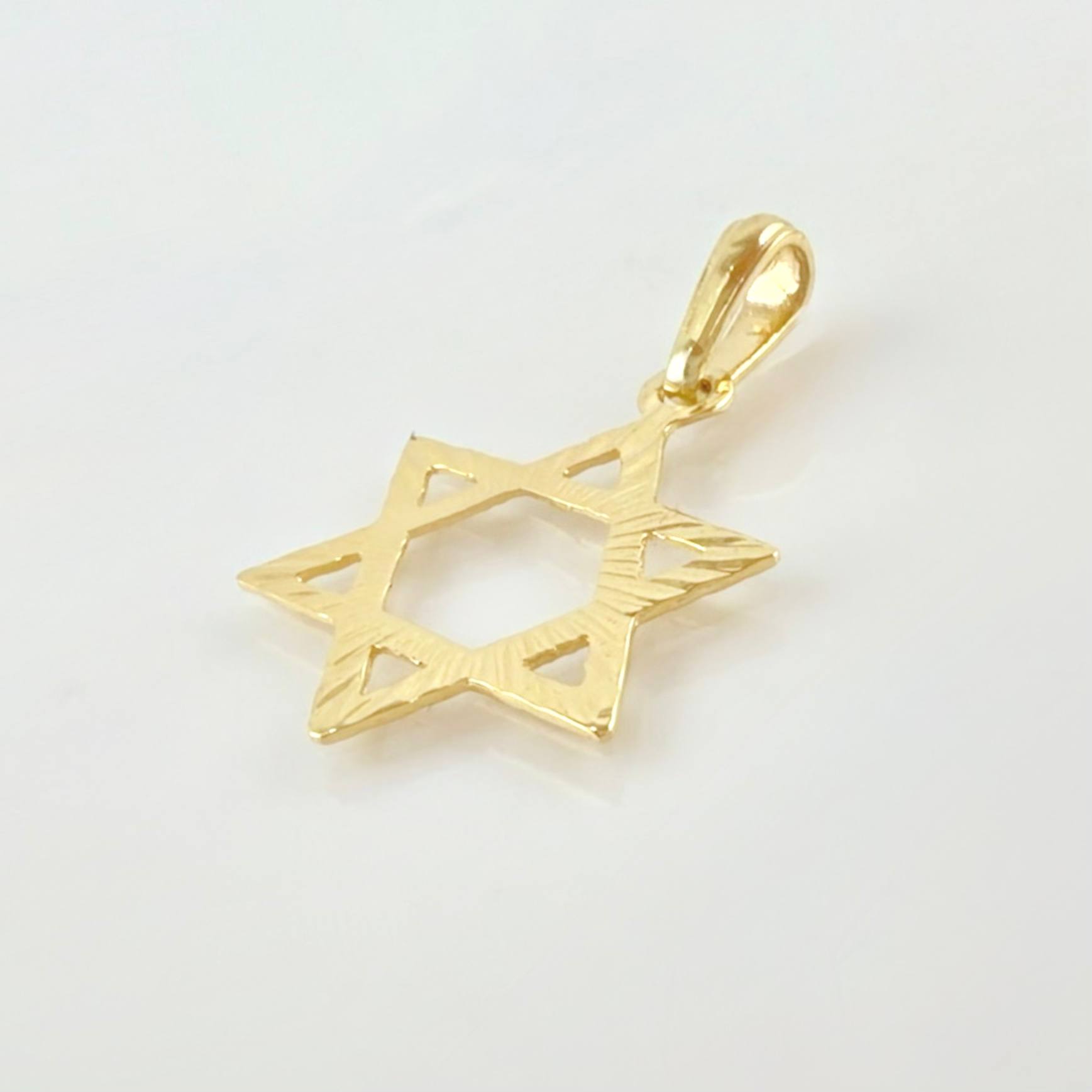 Dije Estrella De David 0.95gr / 1 in / Oro Amarillo 18K *