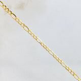 Cadena Figaro 3.75gr / 23 1/2 in / 2.4mm Oro Amarillo +1 18K *