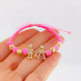 Pulsera Tejida Rosada Herraje Famlilia- Bolas 6Mm / 4 Und Oro Amarillo 18K (A.C)