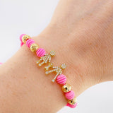 Pulsera Tejida Rosada Herraje Famlilia- Bolas 6Mm / 4 Und Oro Amarillo 18K (A.C)