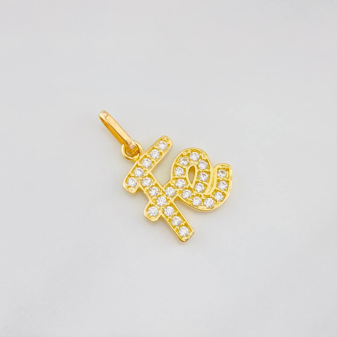 Dije Fe 1.3g / 3/4 in Oro Amarillo 18K