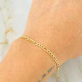 Pulso Figaro 1.75gr / 7 1/2 in / 2.8mm Oro Amarillo +1 18K ©