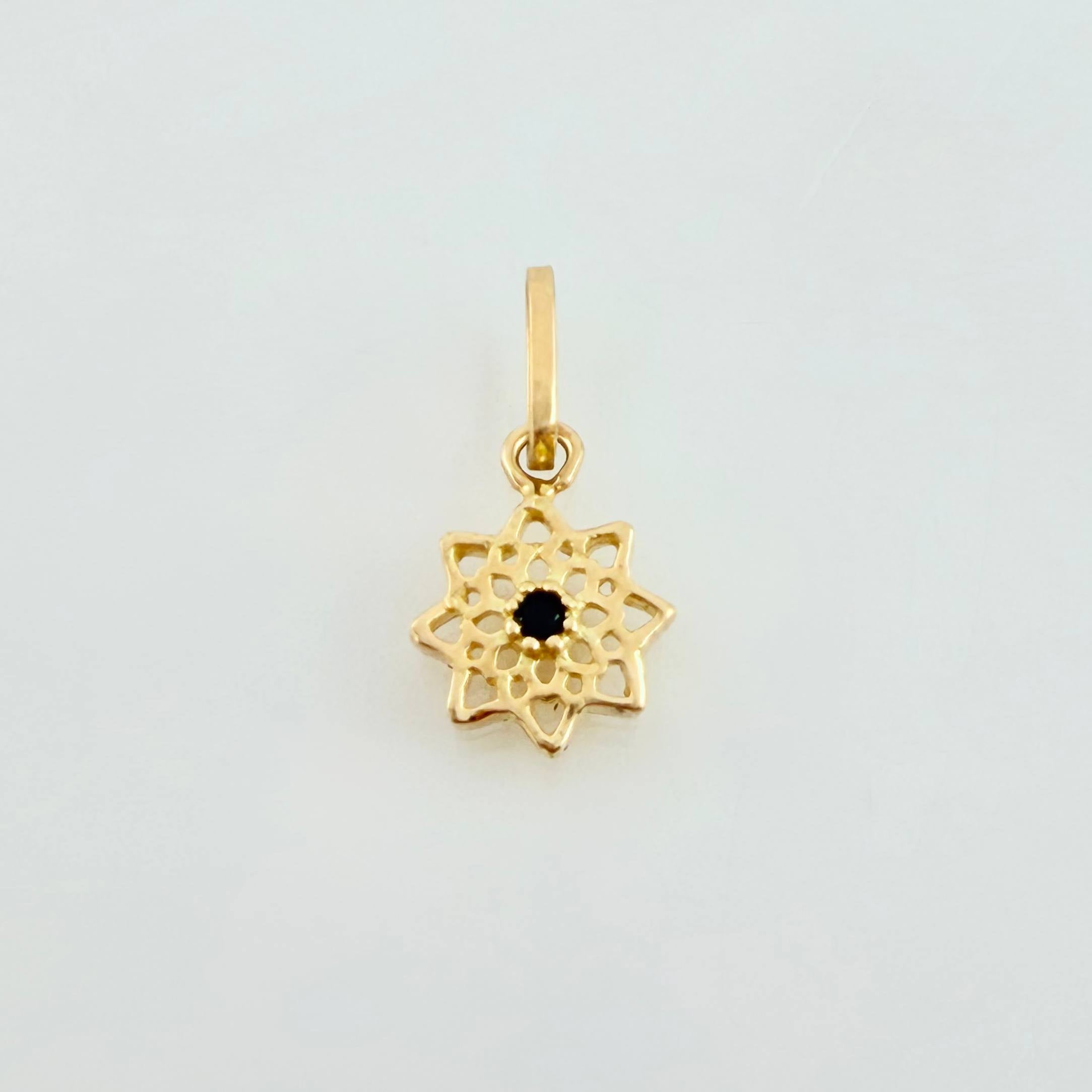 Dije Estrella 8 Puntas 0.45gr / 1/2 in / Oro Amarillo 18K