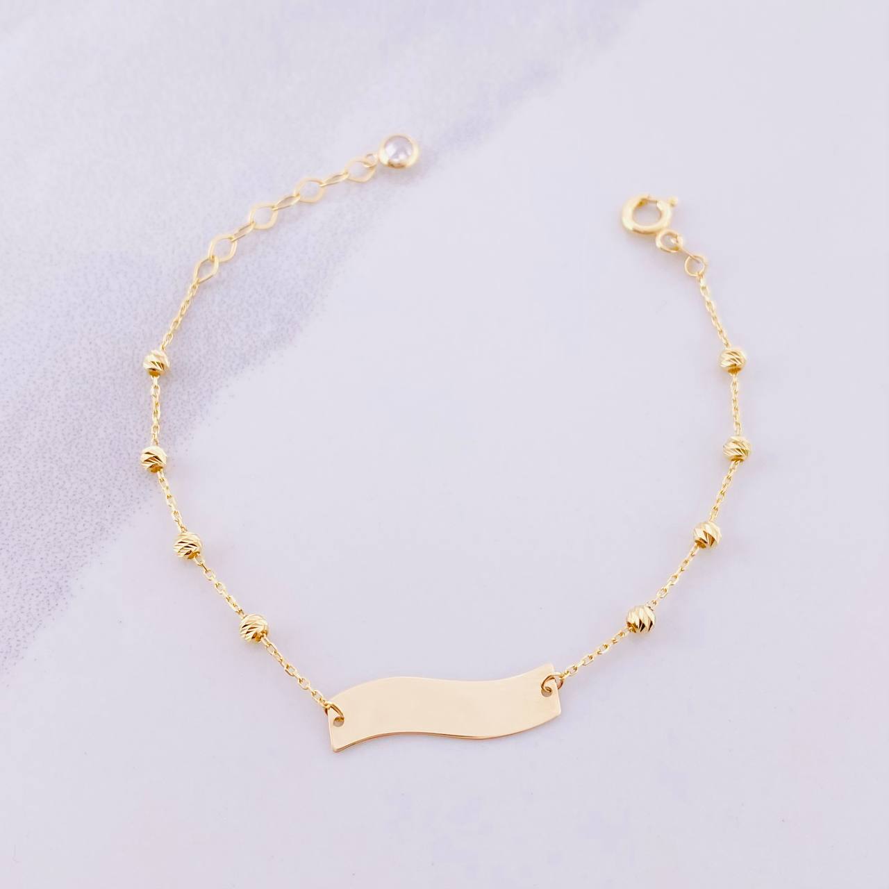 Pulso Placa Curva 1.4g / 5 1/4 in / 2.5mm Oro Amarillo 18K