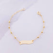 Pulso Placa Curva 1.4g / 5 1/4 in / 2.5mm Oro Amarillo 18K