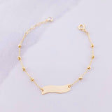 Pulso Placa Curva 1.4g / 5 1/4 in / 2.5mm Oro Amarillo 18K