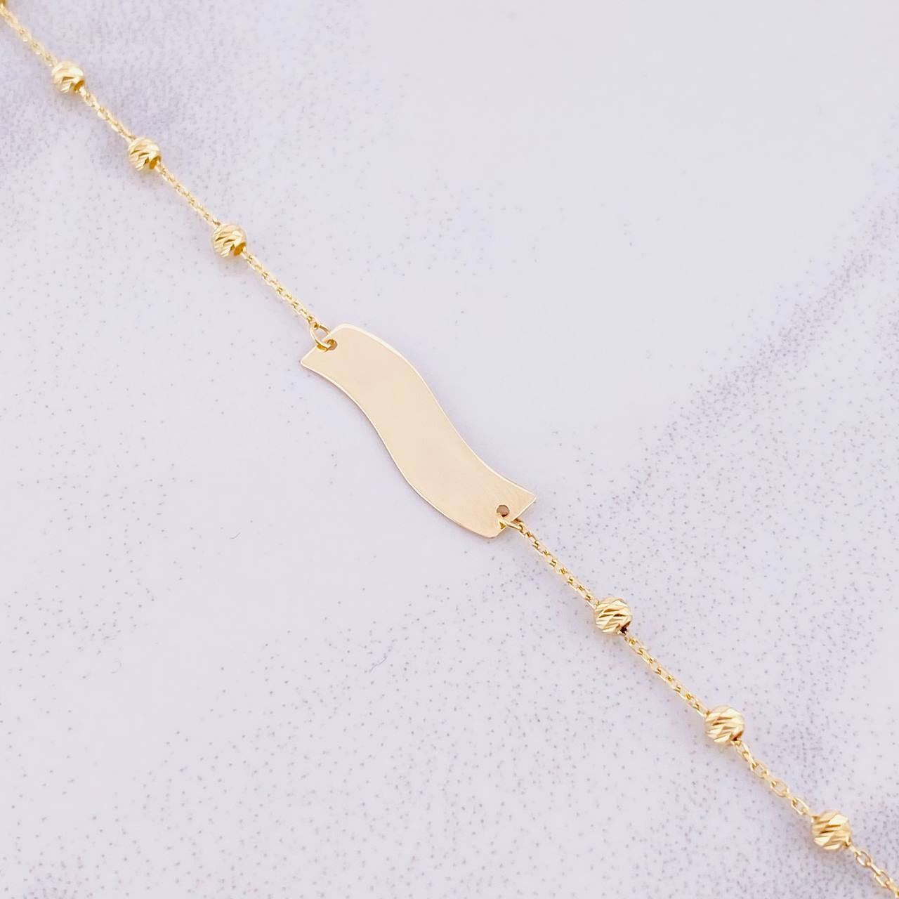 Pulso Placa Curva 1.4g / 5 1/4 in / 2.5mm Oro Amarillo 18K