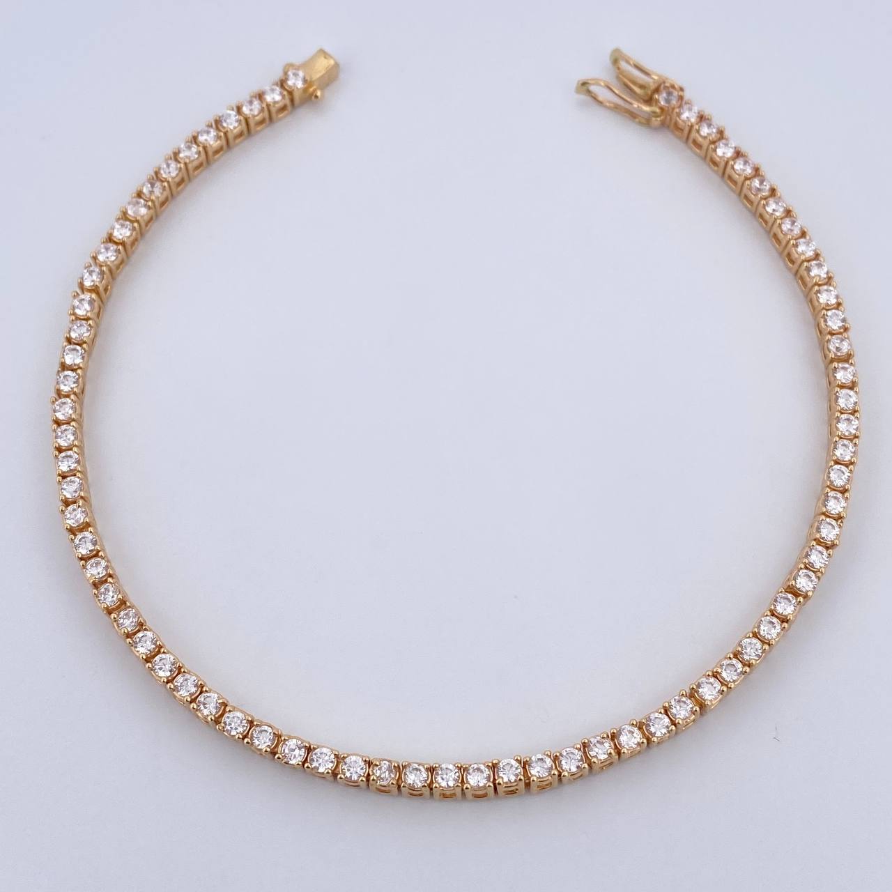 Pulso Tennis 12.15gr / 19.8cm / 2.3mm Circones Blancos Oro Amarillo 18K $