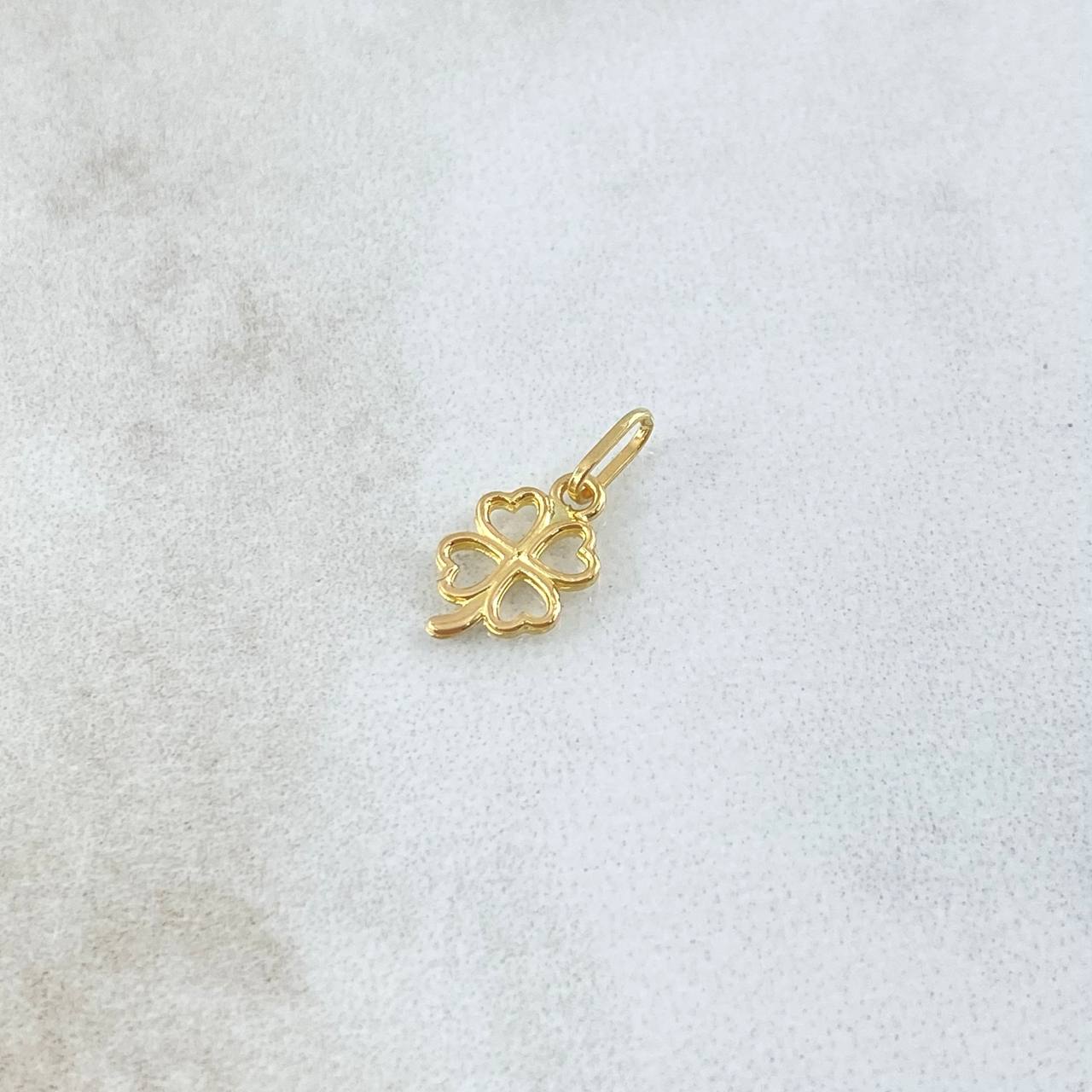 Dije Flor  0.35gr / 1.5cm / Silueta Lisa  Oro Amarillo 18K ©