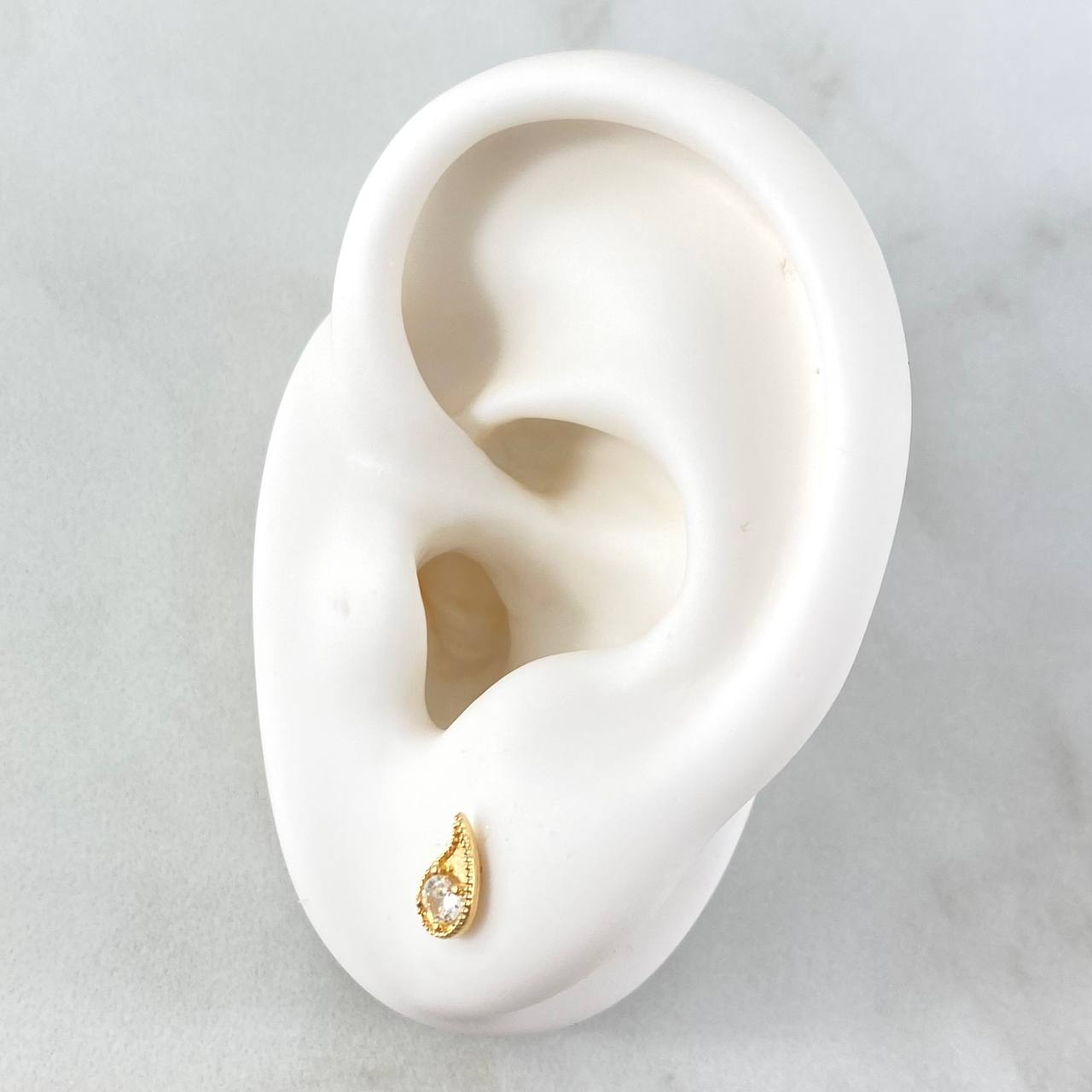 Topos Gota 0.85gr / 7mm Circon Blanco Oro Amarillo 18K