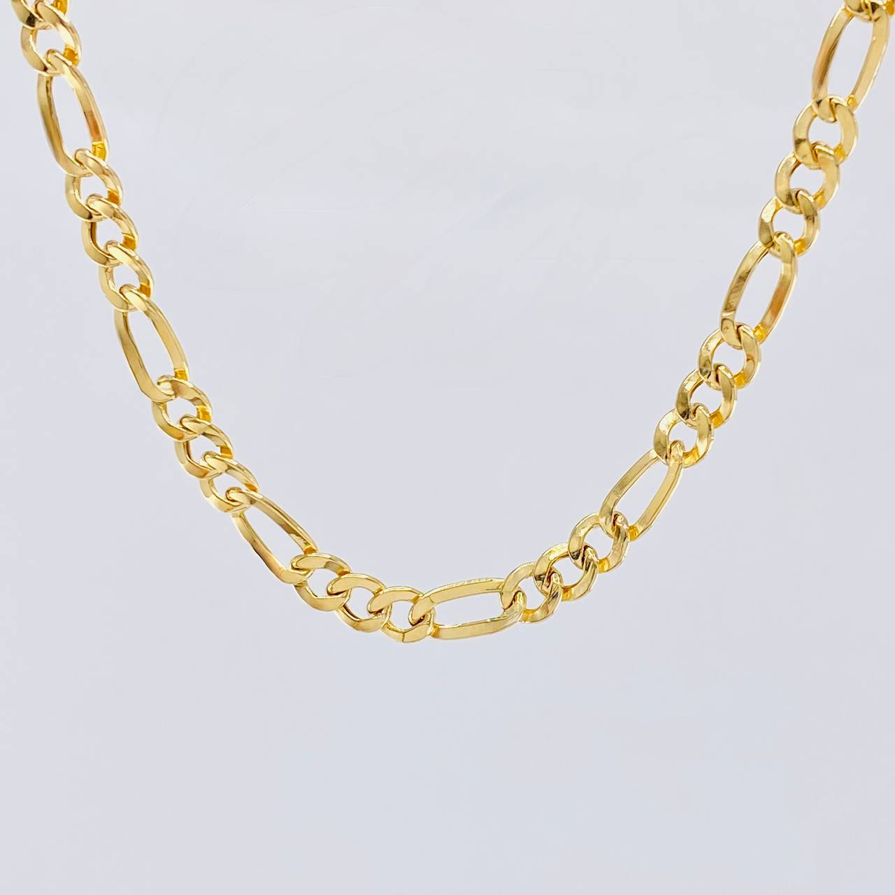 Cadena Figaro 13.1 g / 24 in / 6.5 mm Oro Amarillo 18K