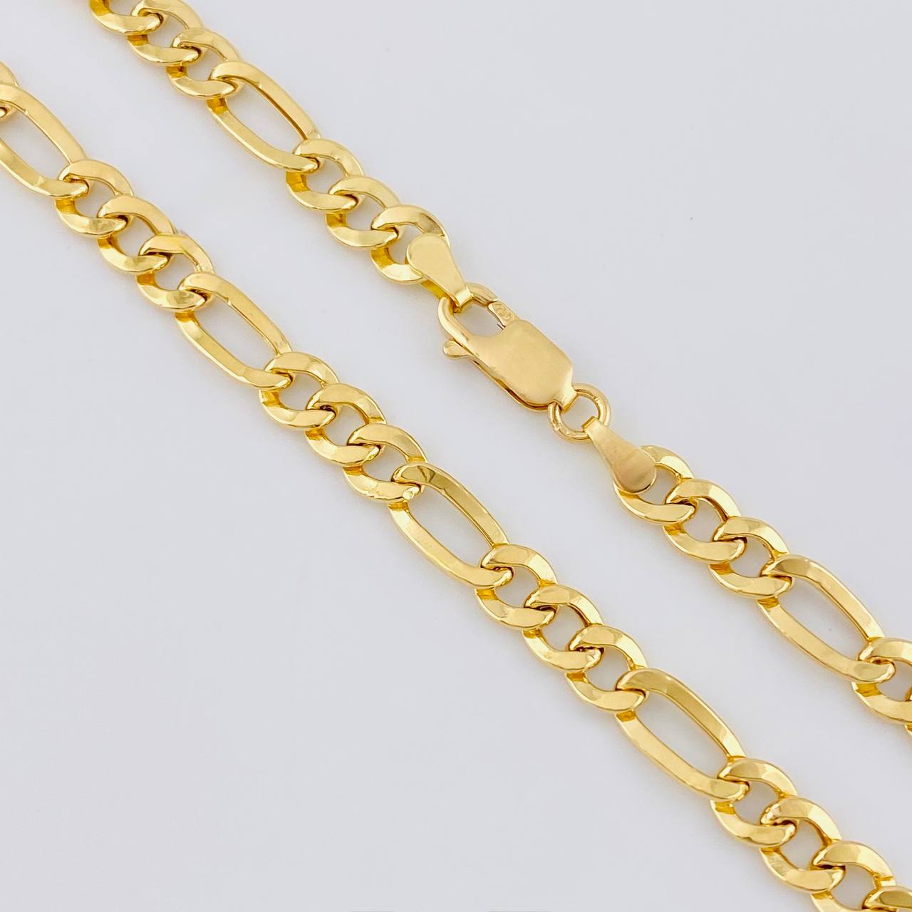Cadena Figaro 13.1 g / 24 in / 6.5 mm Oro Amarillo 18K