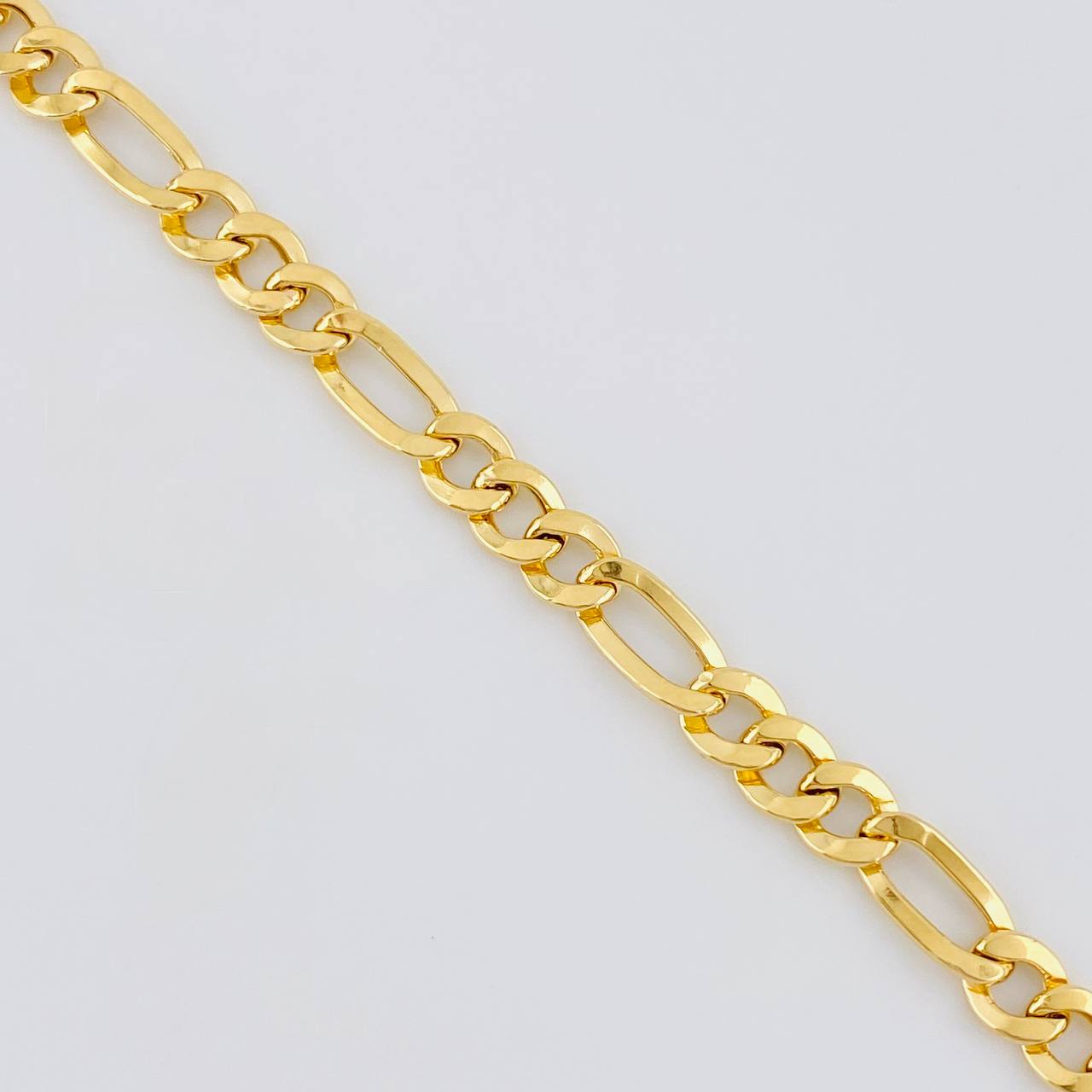 Cadena Figaro 13.1 g / 24 in / 6.5 mm Oro Amarillo 18K