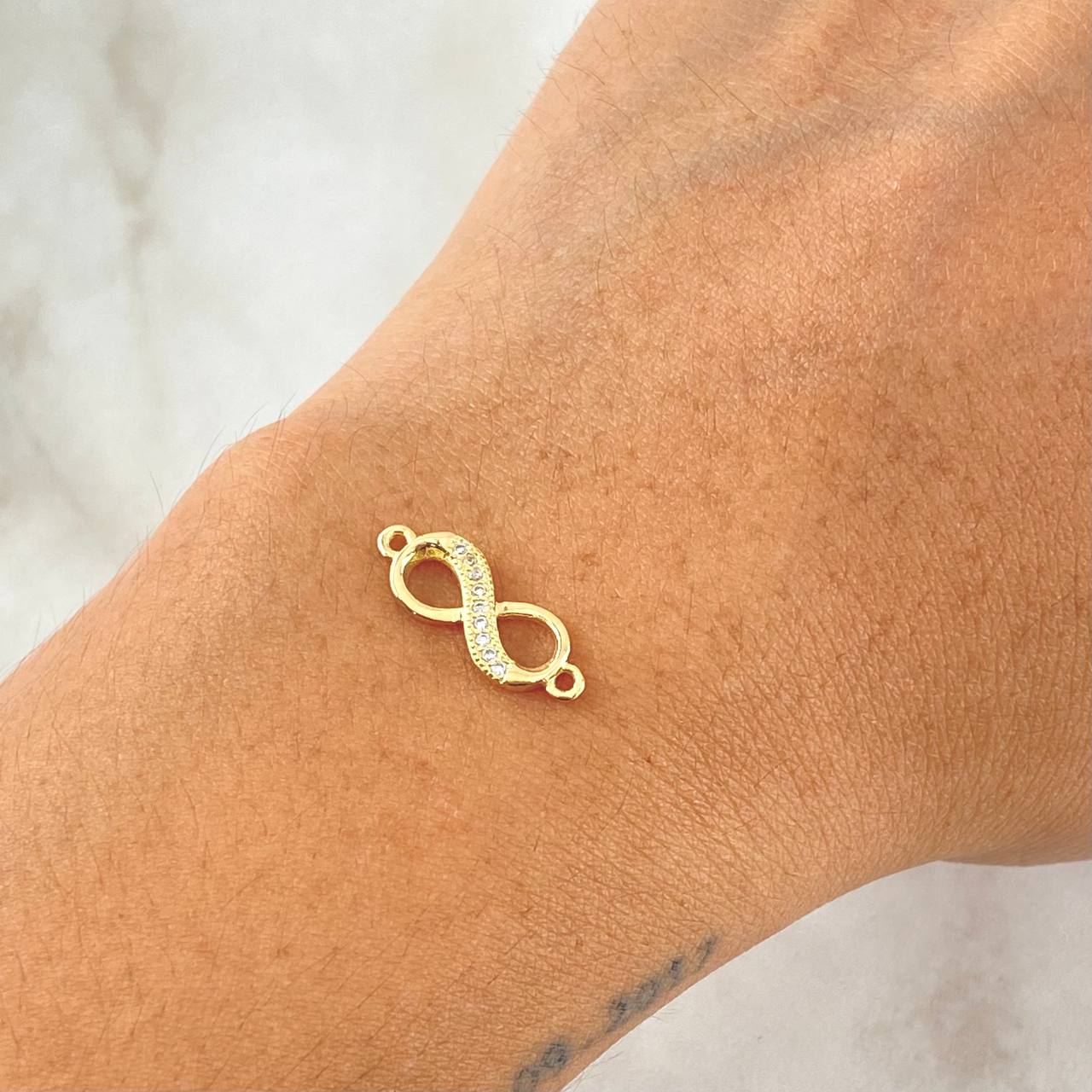 Herraje Infinito 0.65gr / 1.7cm / Circones Blancos Oro Amarillo 18K ©
