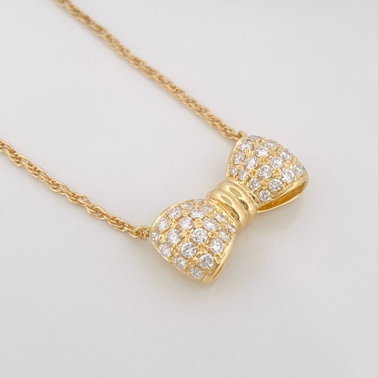Cadena Singapur Moño Diamantes 40pts 5g / 16 in / 1.24mm Oro Amarillo 18K