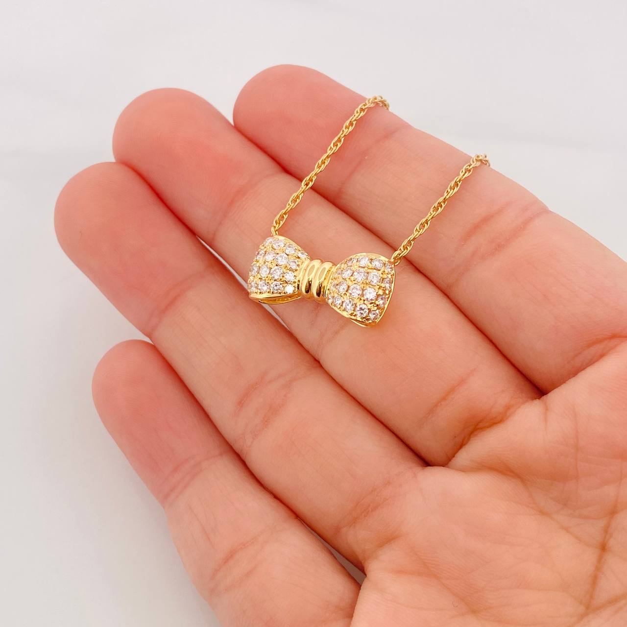 Cadena Singapur Moño Diamantes 40pts 5g / 16 in / 1.24mm Oro Amarillo 18K