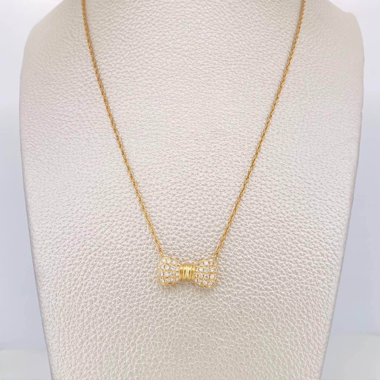 Cadena Singapur Moño Diamantes 40pts 5g / 16 in / 1.24mm Oro Amarillo 18K