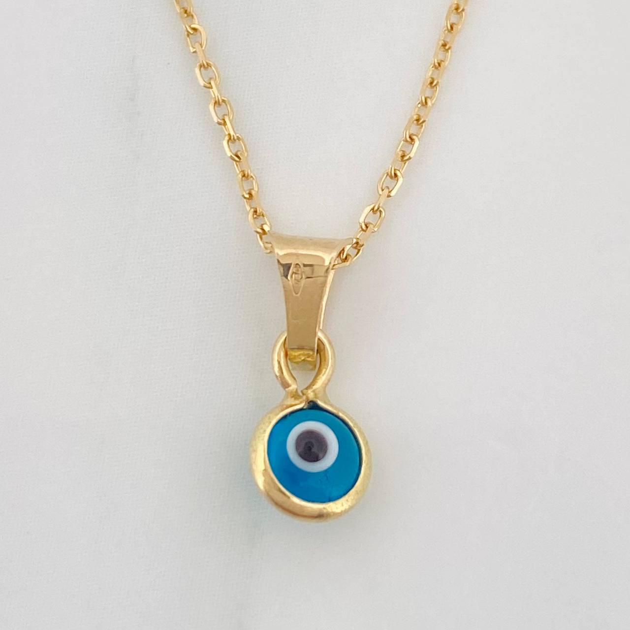 Set Cadena Aro Seguido + Dije Ojo Turco / 1.5g / 18 in Oro Amarillo 18K