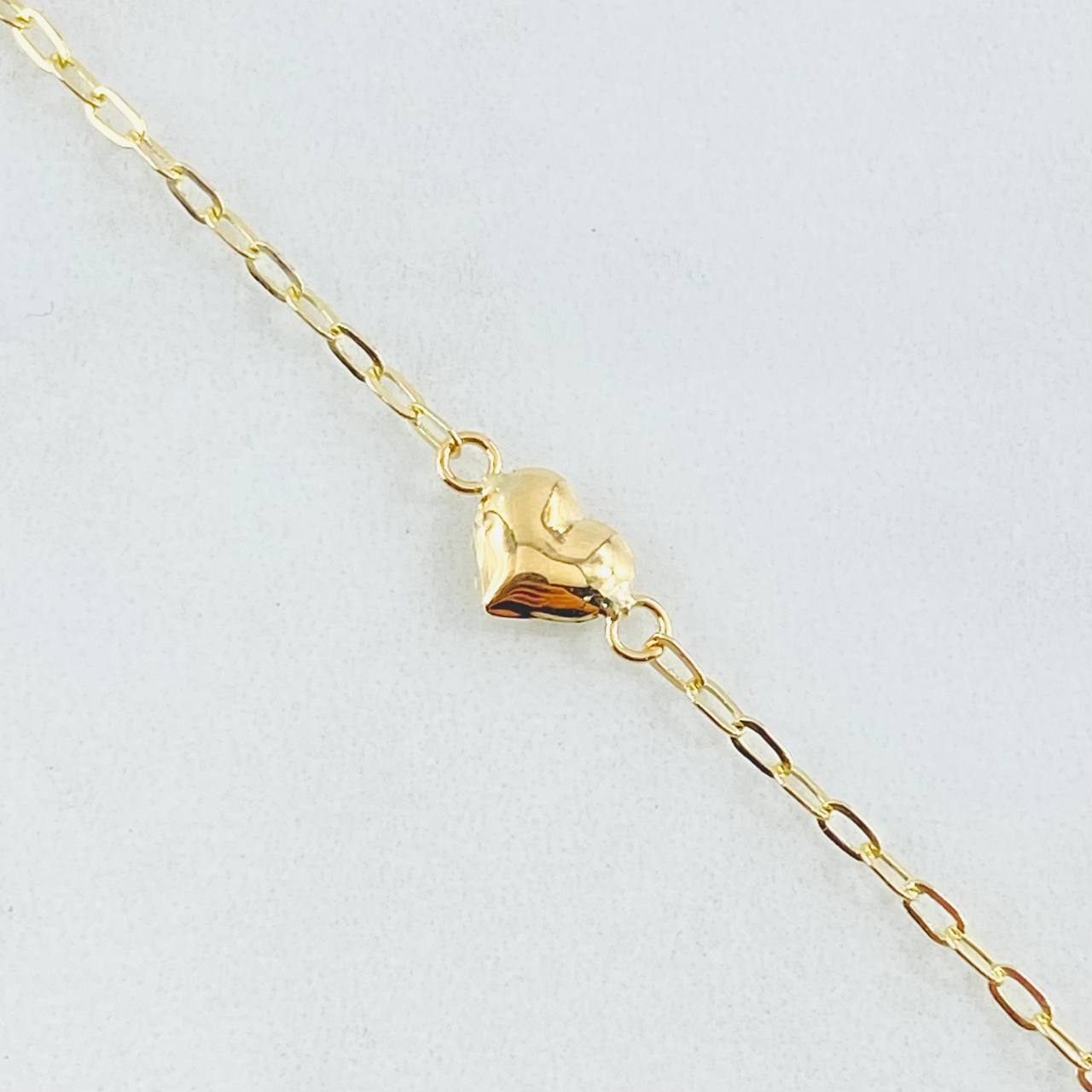 Pulso Aro Seguido Corazón 1.65gr / 7 in / 1.8mm Oro Amarillo 18K ©
