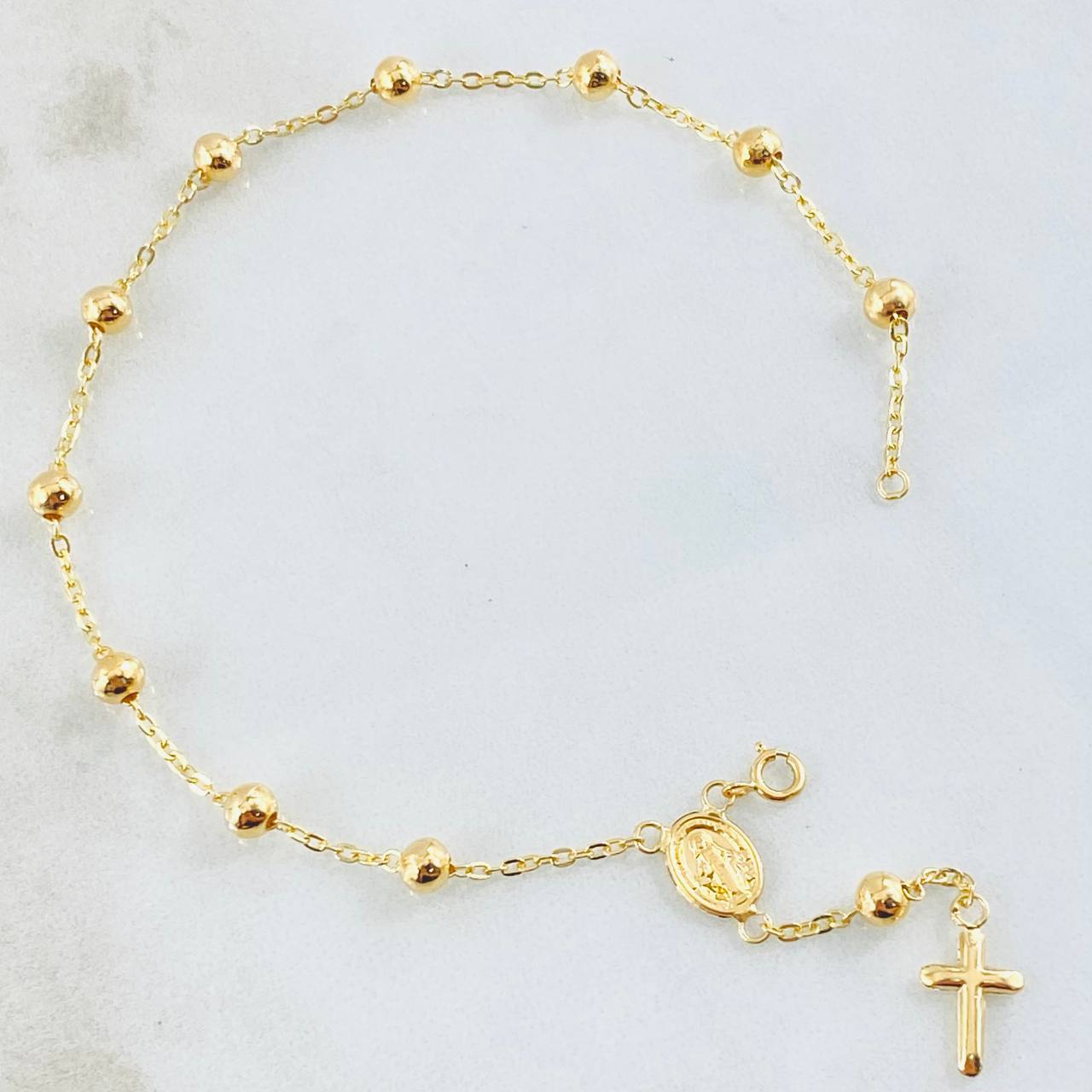 Pulso Denario Virgen Milagrosa Cruz 2.2gr / 7 1/2 in / 4mm Oro Amarillo 18K ©
