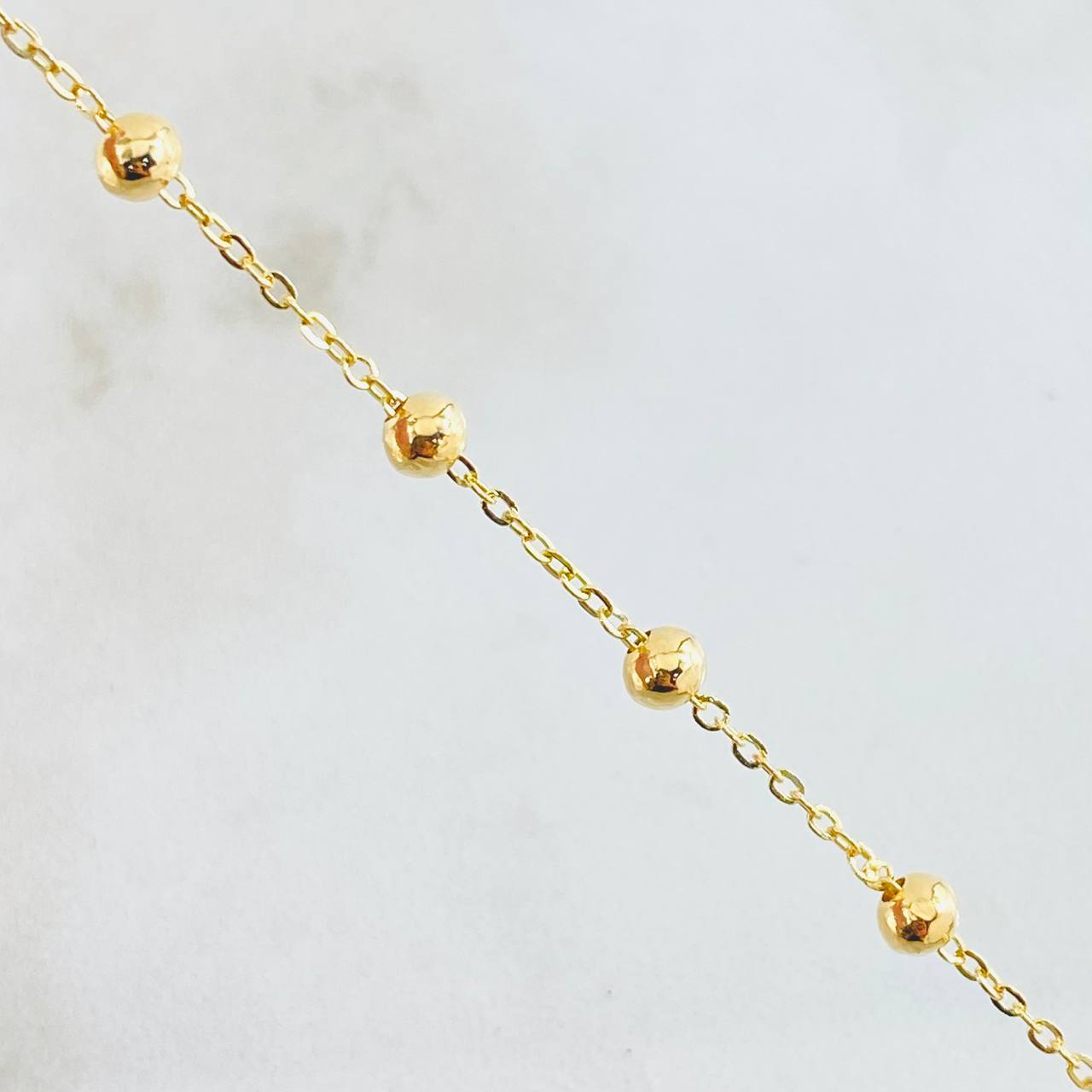 Pulso Denario Virgen Milagrosa Cruz 2.2gr / 7 1/2 in / 4mm Oro Amarillo 18K ©