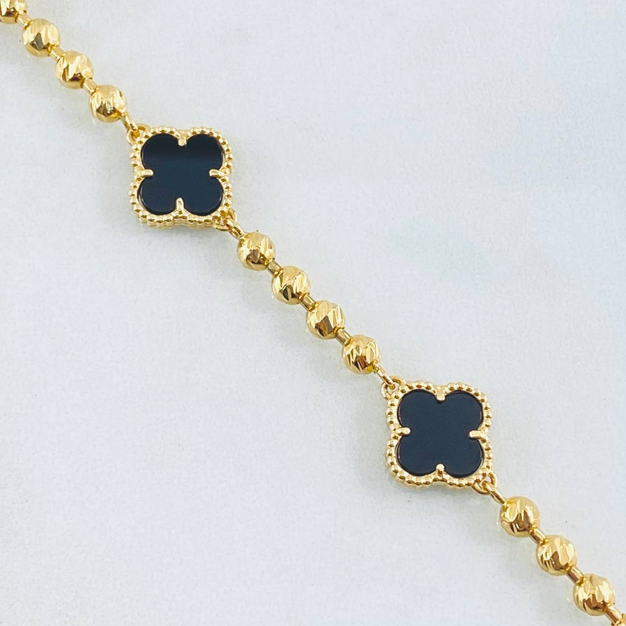 Pulso Trebol Negro 10.9gr / 7 3/4 in / 9mm Oro Amarillo Nac.Esp. 18K ©