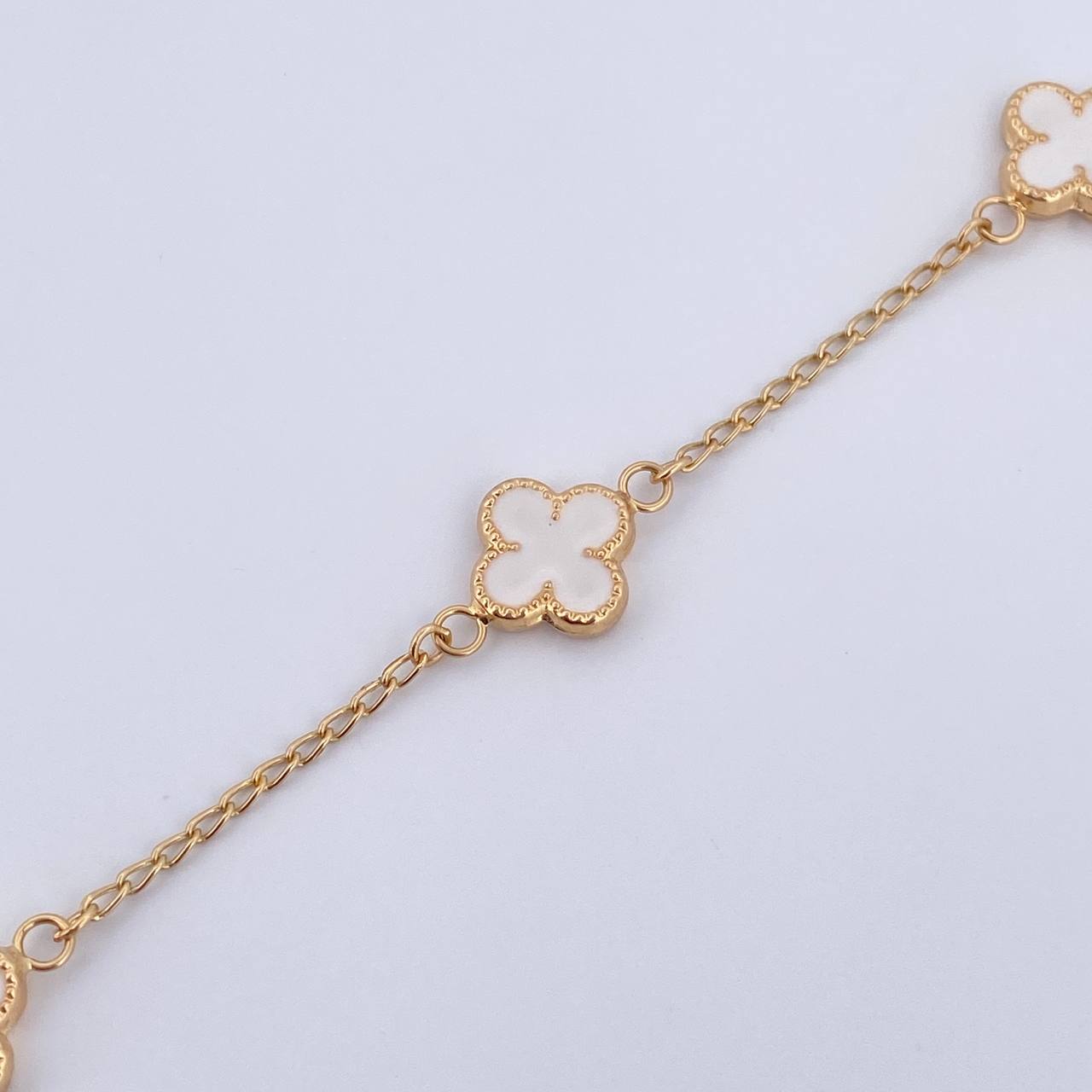 Pulso Trebol Espiga 3.35gr / 18.3cm / 1.4mm Electroestatico Blanco Oro Amarillo 18K &