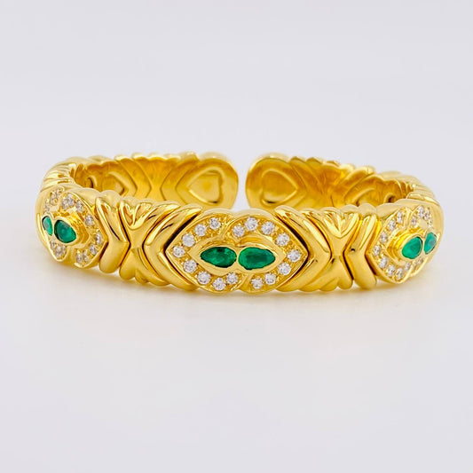 Bracelet Intertwined Hearts Diamonds 2.17 carats Emeralds 96 points 59.65g / 6 in / 11.8mm Yellow Gold 18K