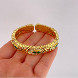 Bracelet Intertwined Hearts Diamonds 2.17 carats Emeralds 96 points 59.65g / 6 in / 11.8mm Yellow Gold 18K