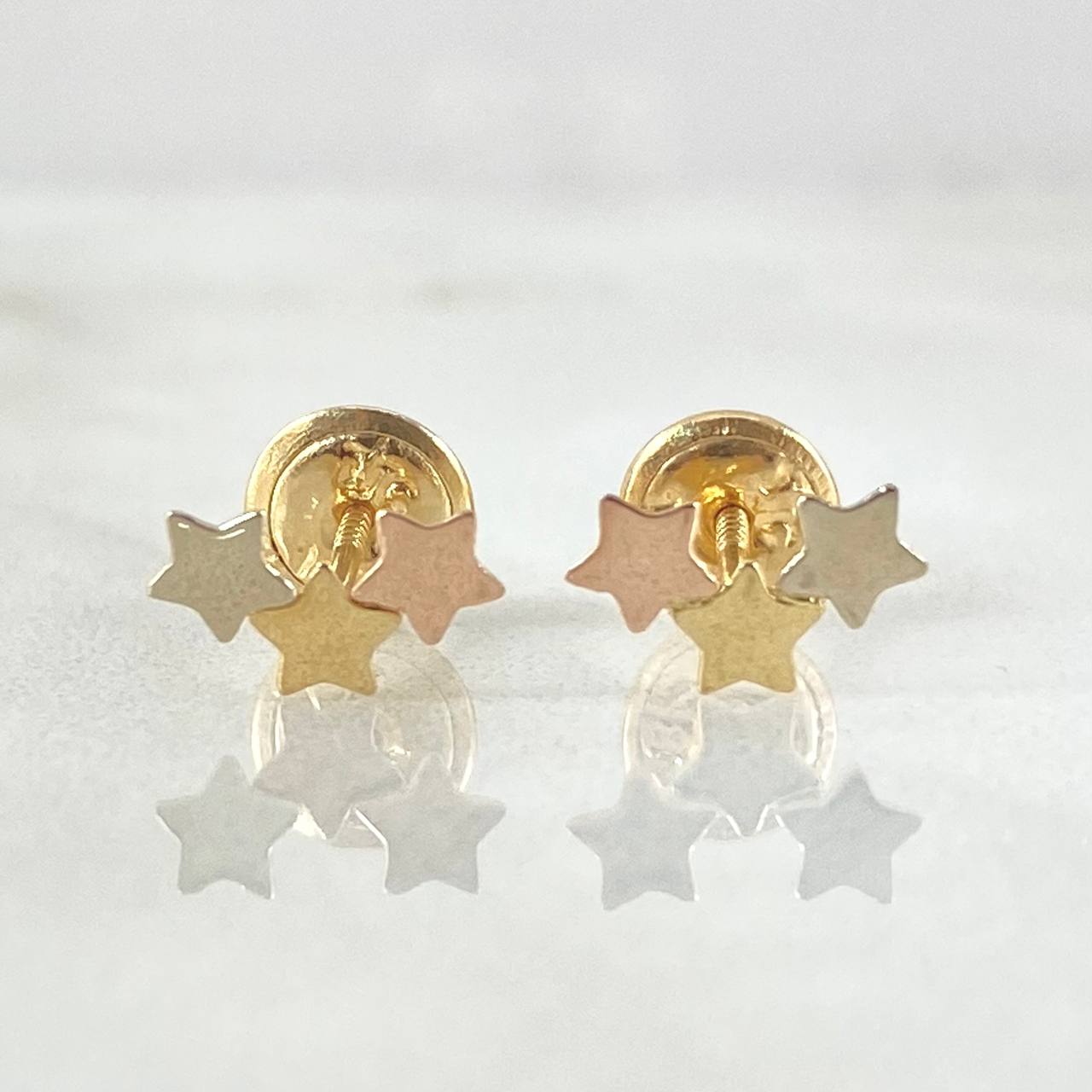 Topos Trio Estrellas 0.55gr / Tres Oros 18K ©