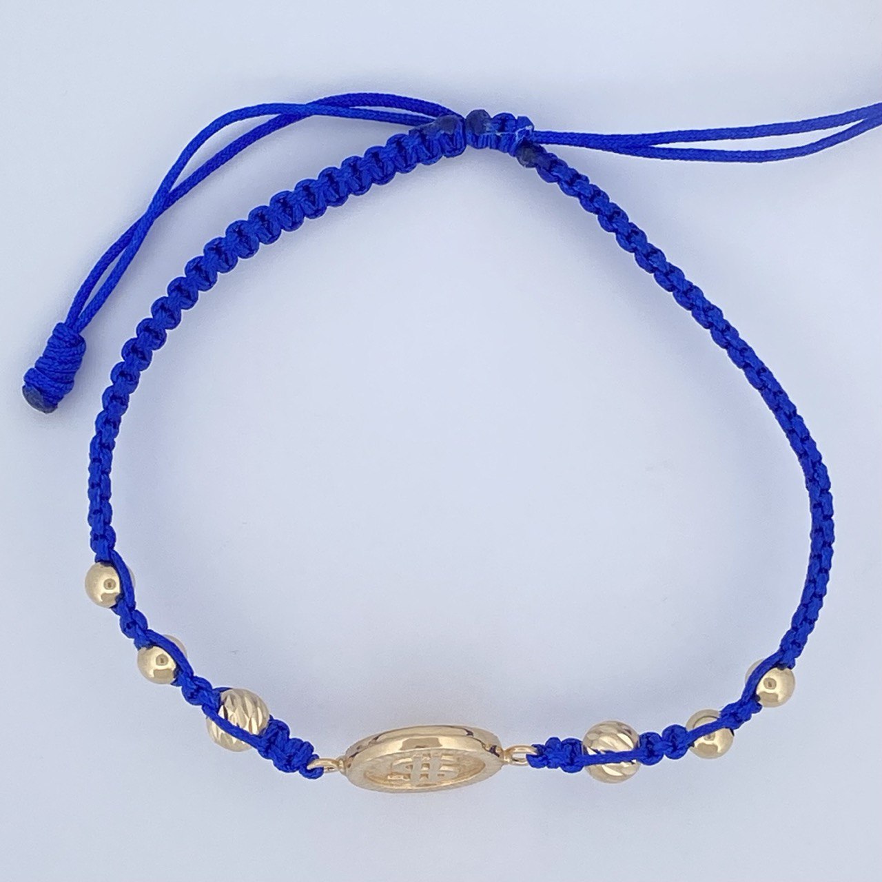 Pulsera Tejida Azul Signo Dólar 1.75gr / Oro 18K $