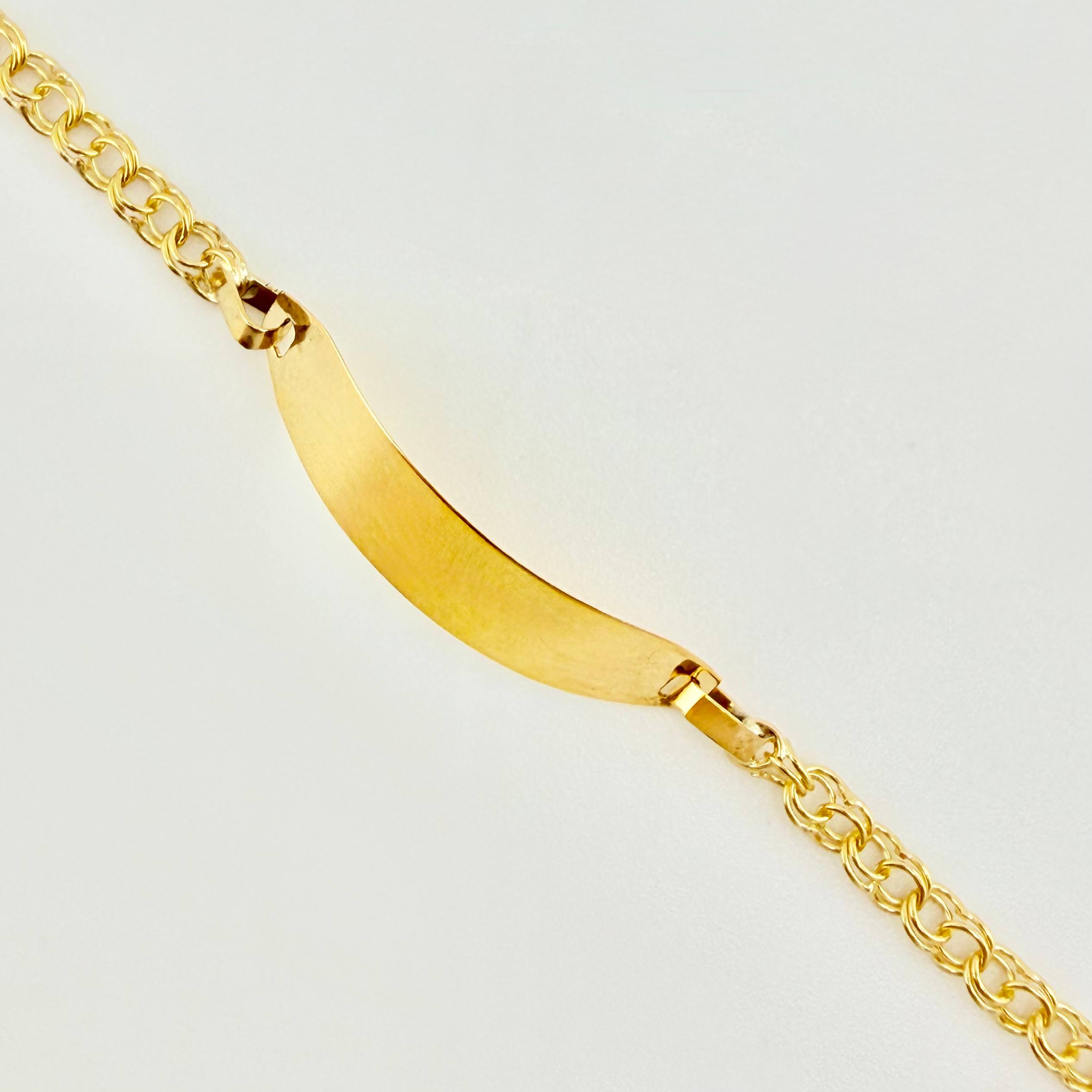 Pulso Bebé Roll On Placa Ovalada Lisa 1.35gr / 5 3/4 in / 2.3mm Oro Amarillo 18K