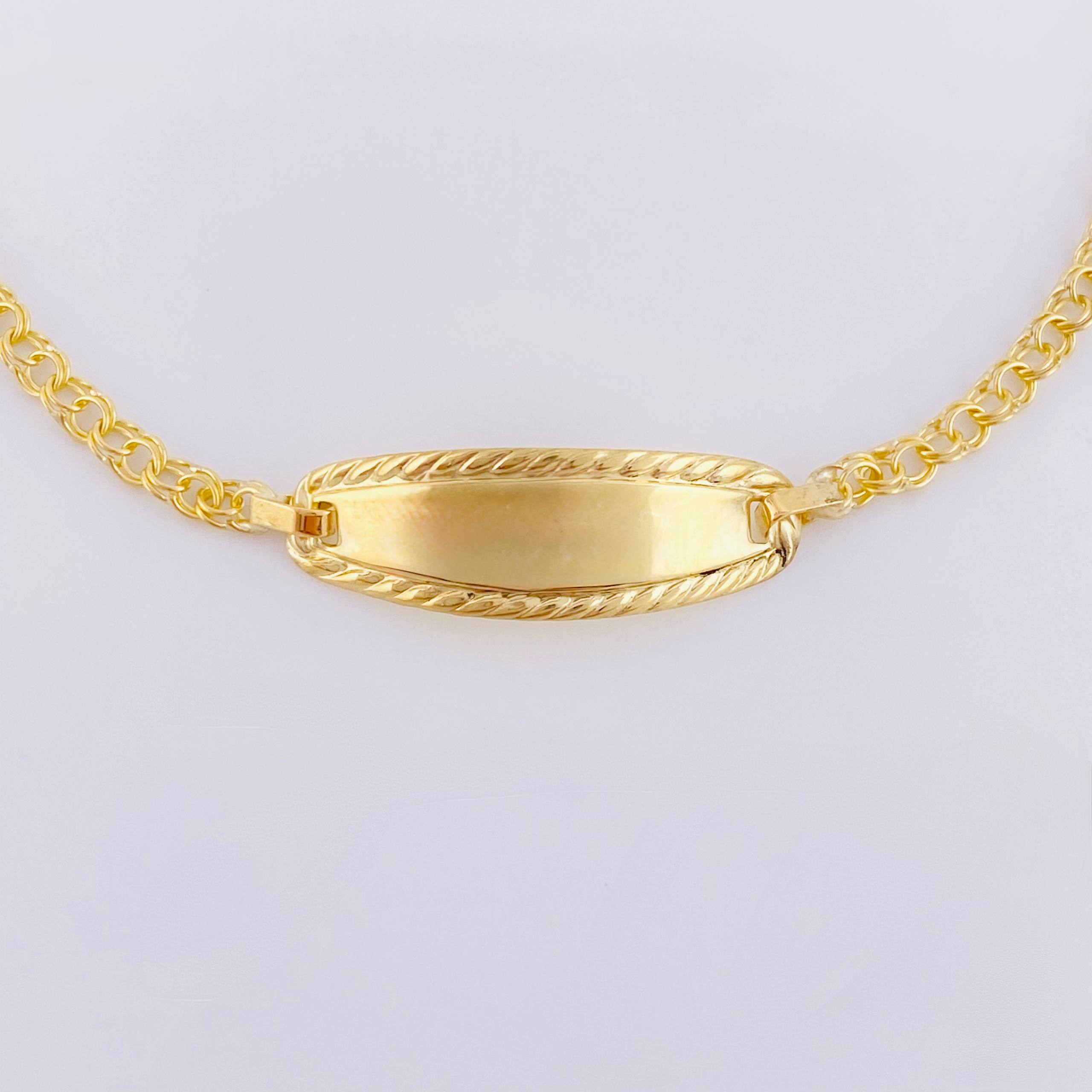Pulso Bebé Roll On Placa Ovalada Relieve 1.35gr / 5 3/4 in / 2.3mm Oro Amarillo 18K