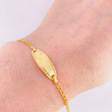Pulso Bebé Roll On Placa Ovalada Relieve 1.35gr / 5 3/4 in / 2.3mm Oro Amarillo 18K
