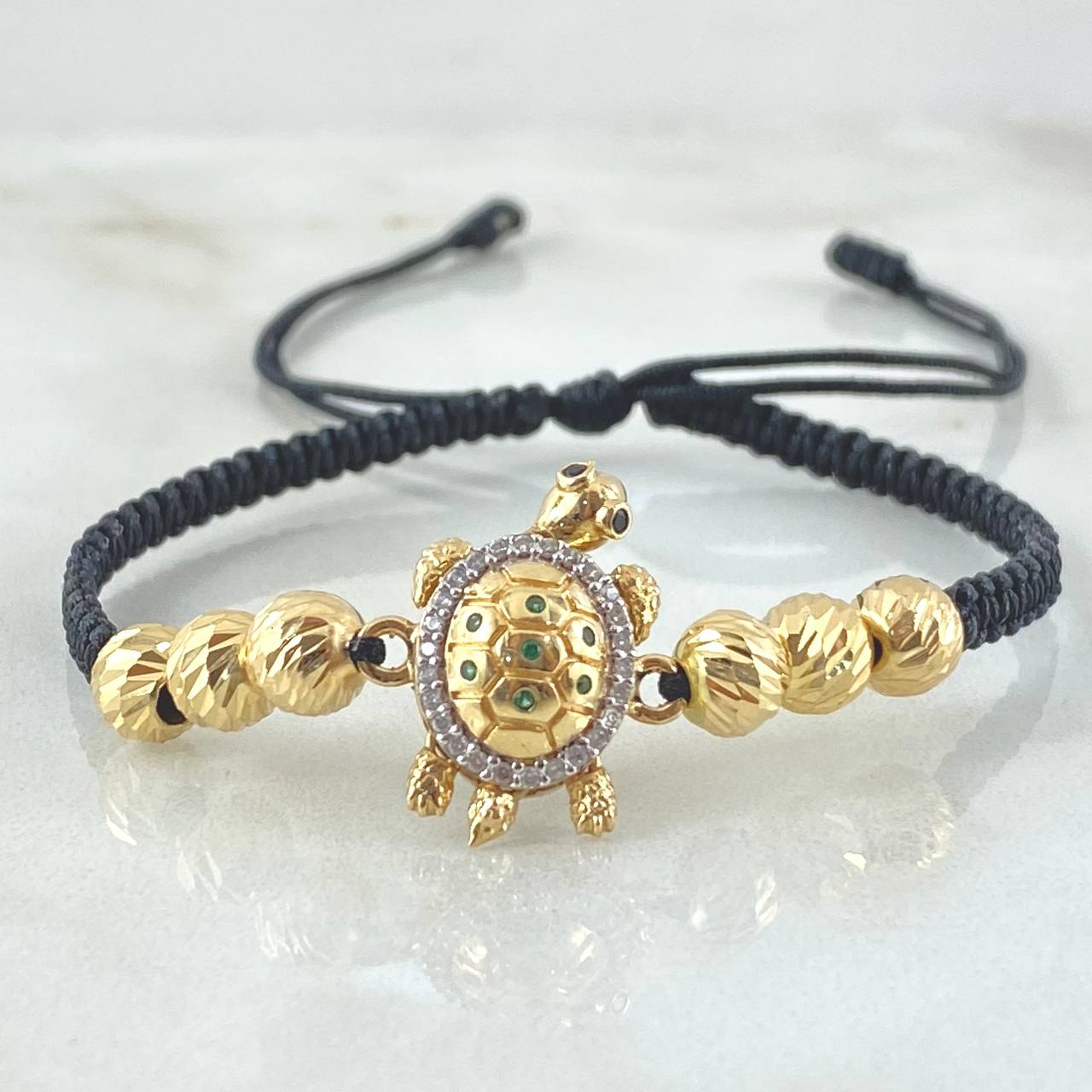 Pulsera Negra Herraje Tortuga Movil 3.65gr / Oro 18K ©