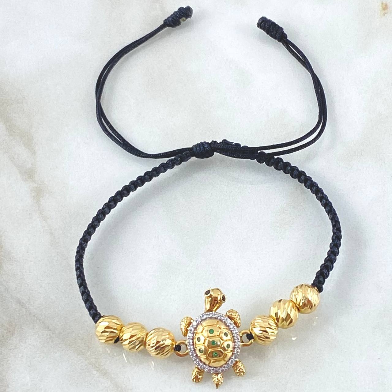 Pulsera Negra Herraje Tortuga Movil 3.65gr / Oro 18K ©