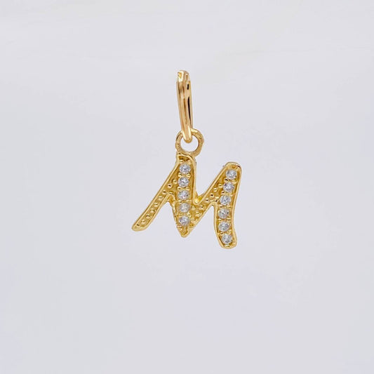 Dije Letra M Cursiva 0.6 g / 1 in Oro Amarillo 18K