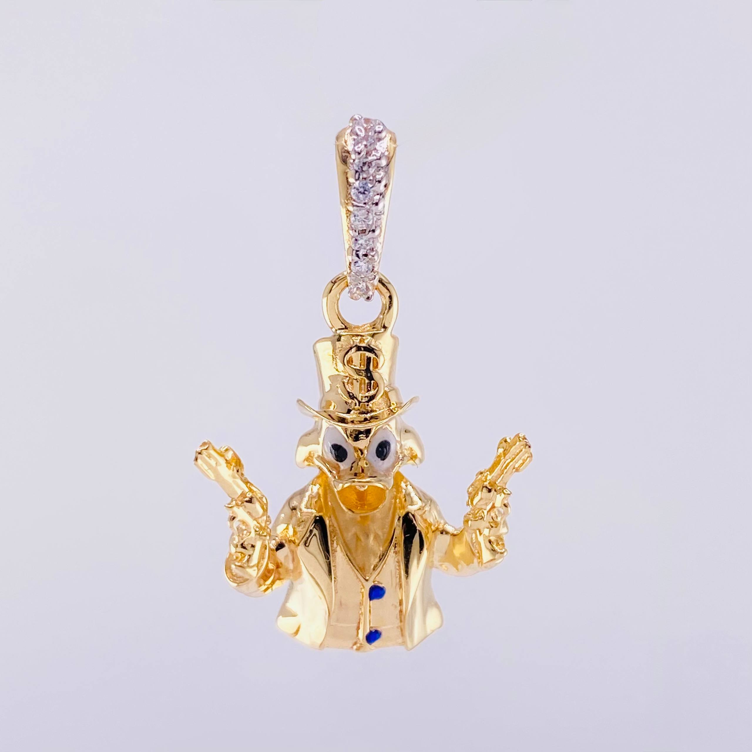 Dije Pato Pistolas 2.4g / 1 in Oro Amarillo 18K