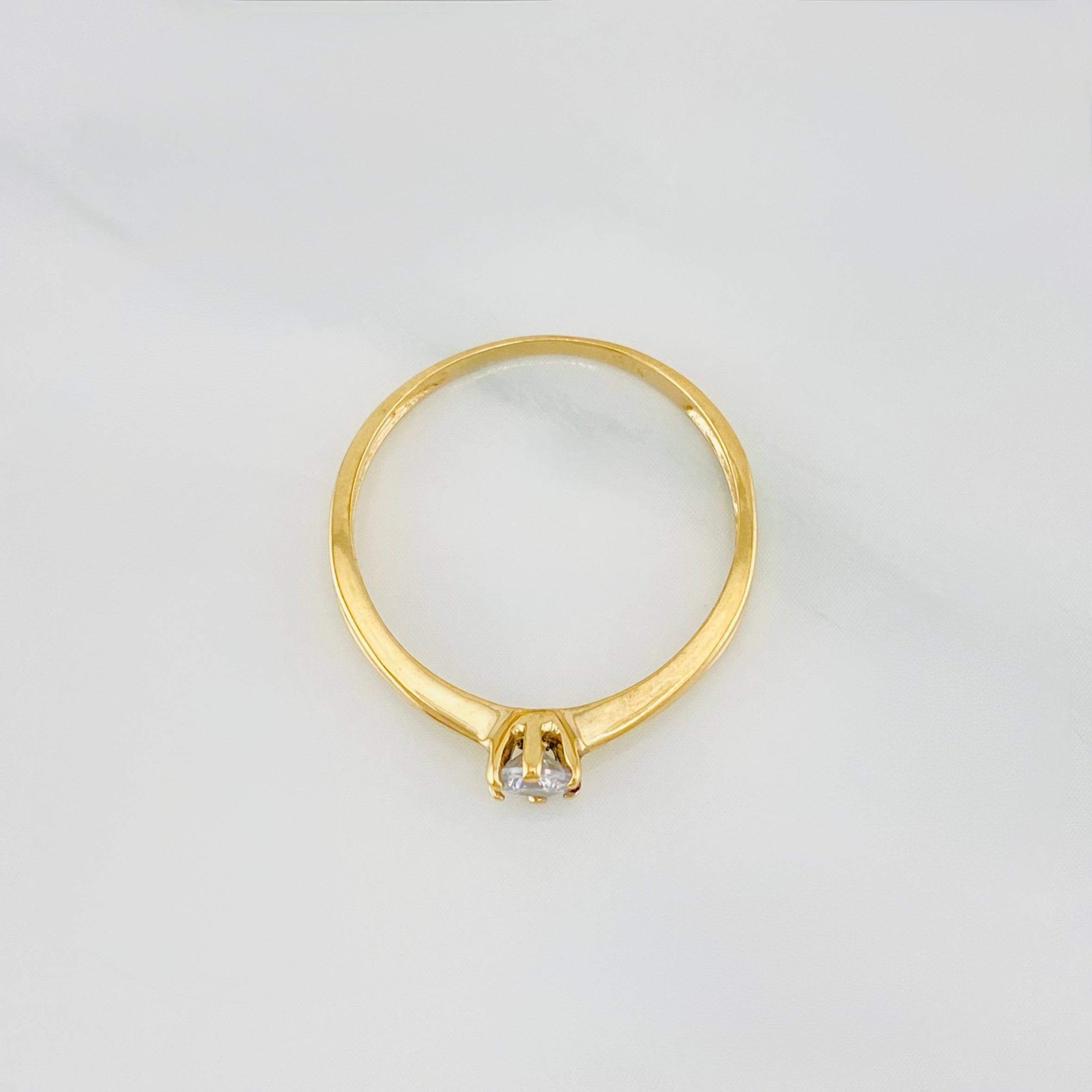 1.3 g Solitaire Ring / T6 1/4 18K Yellow Gold