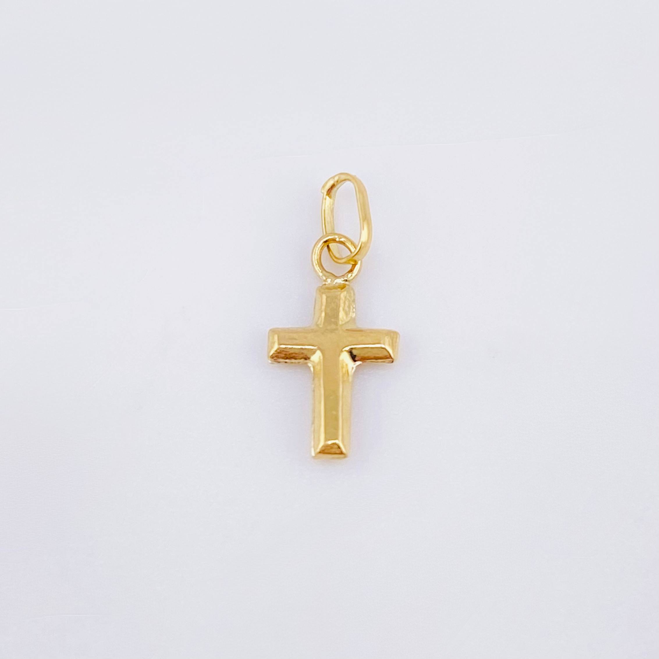 Dije Cruz 0.15gr / 1/2 in / Oro Amarillo 18K ©