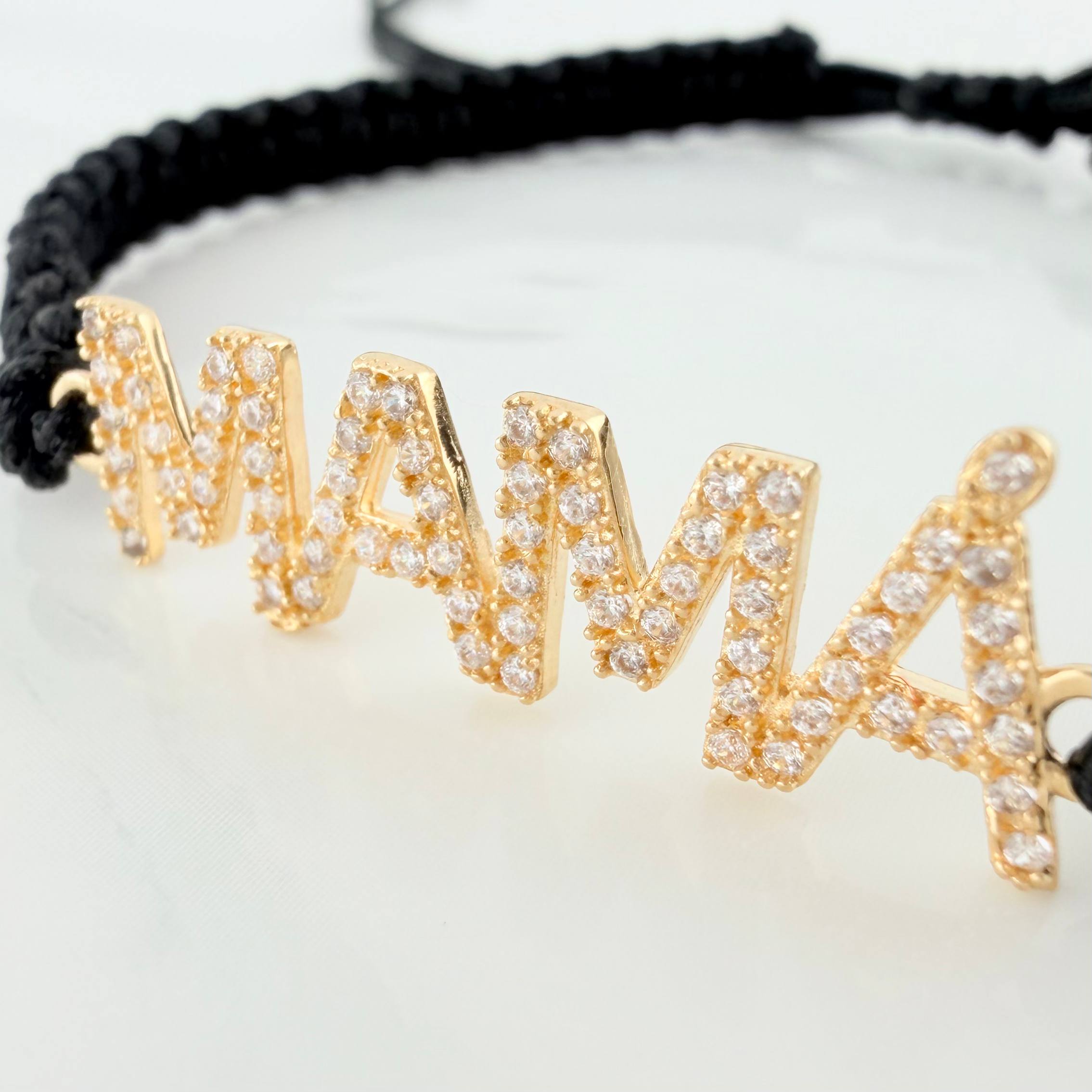 Pulsera Tejida Negra Mamá Oro Amarillo 18K