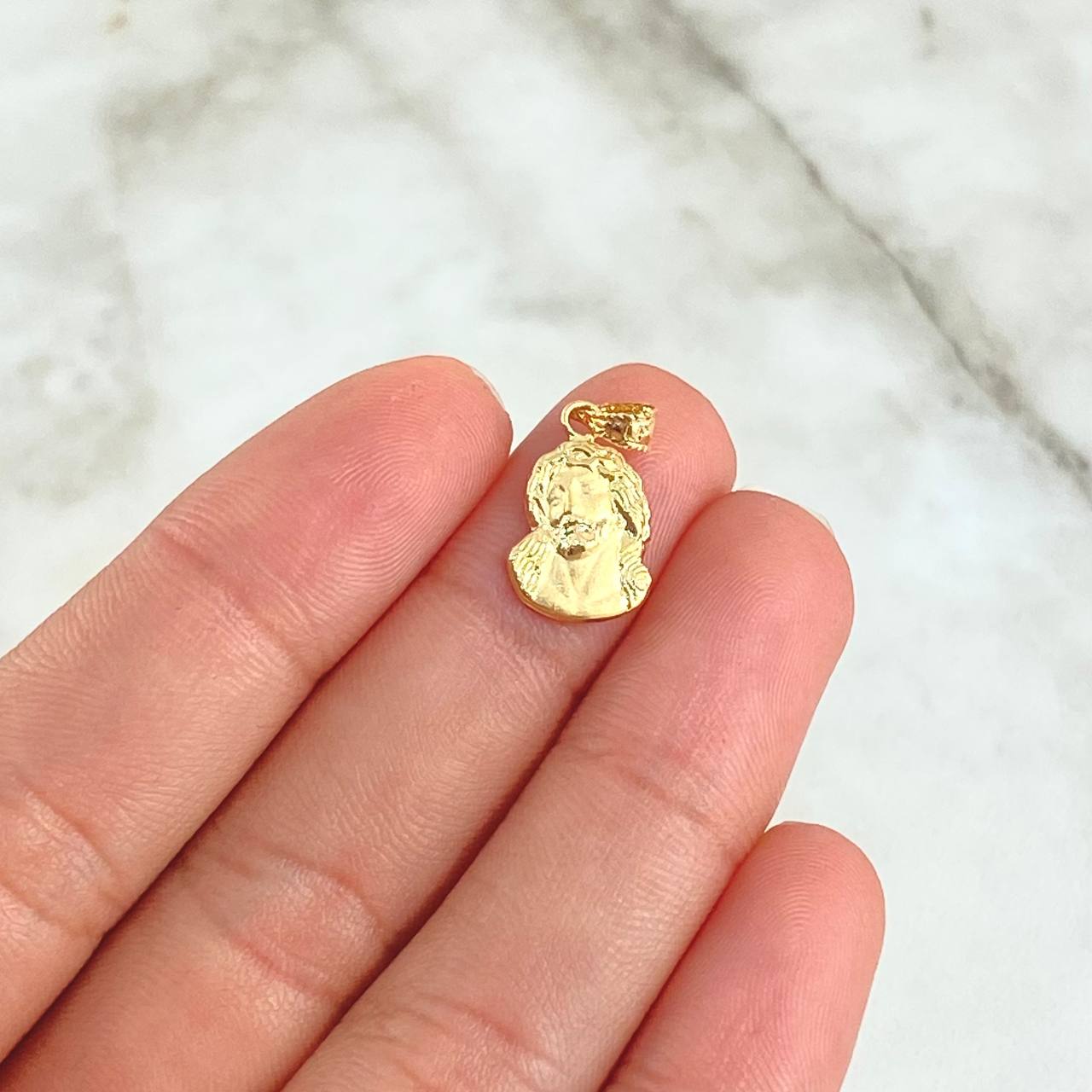 Dije Rostro de Cristo 0.5g / 3/4 in Oro Amarillo 18K