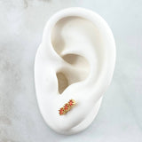 Topos Topos Hilera Triple 1.55gr / 9mm Circones Naranjados Broche Mariposa  Oro Amarillo 18K *